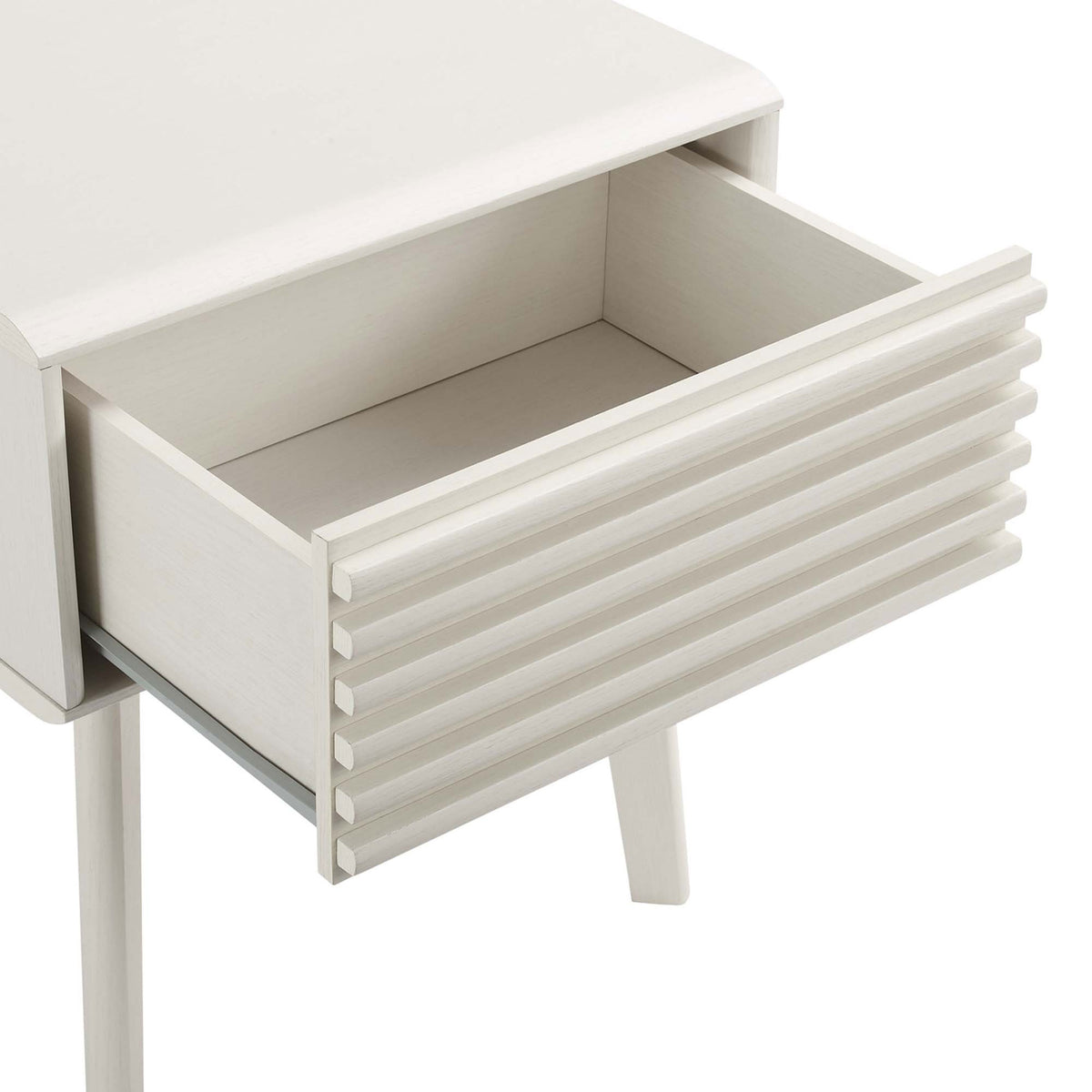 Spacious white drawer glides smoothly open to reveal ample storage space for bedside essentials. || EEI-3345-WHI || storage_open_studio