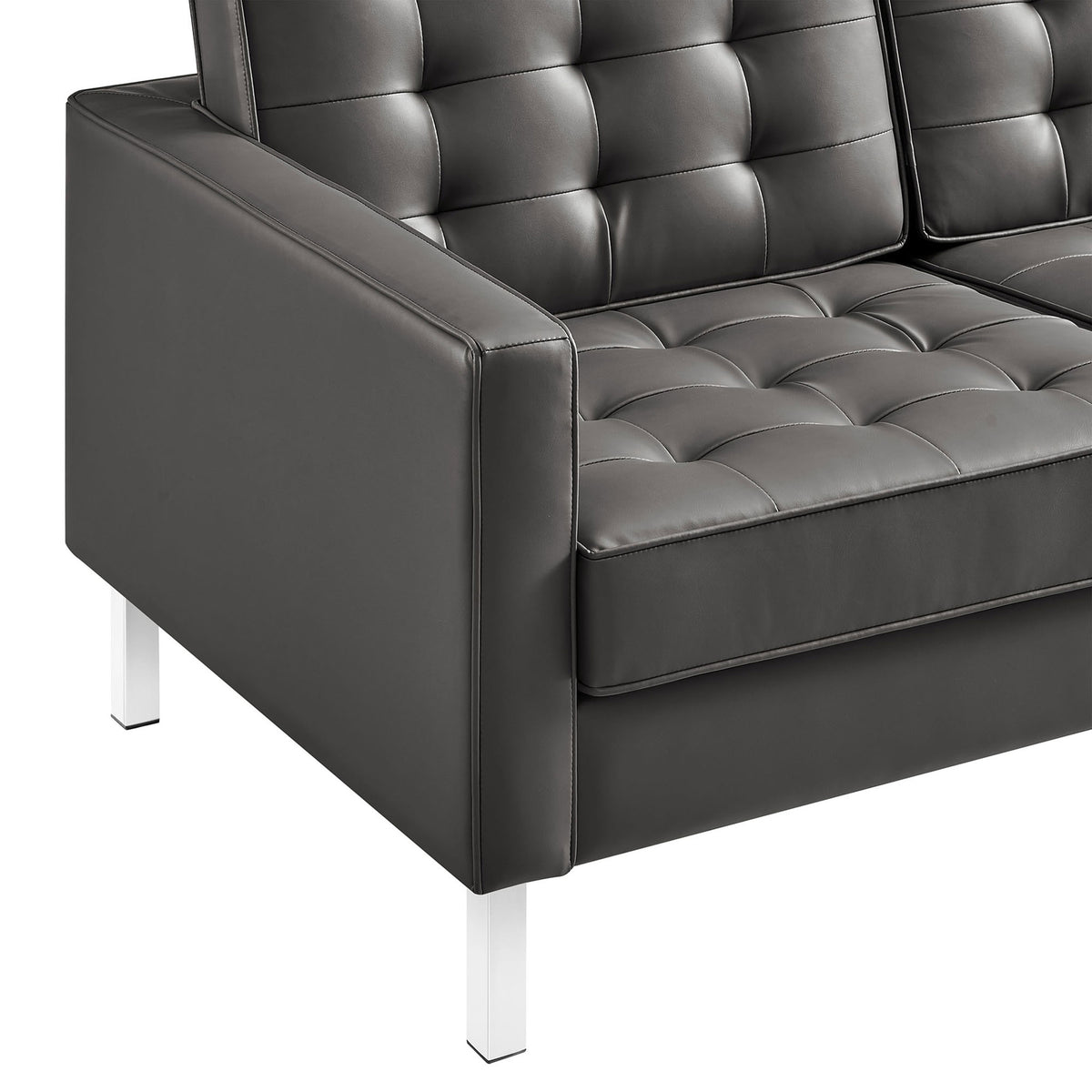 Detail of tufted vegan leather seat and back cushions with crisp stitching and slim arm design || EEI-3385-SLV-GRY || detail_studio
