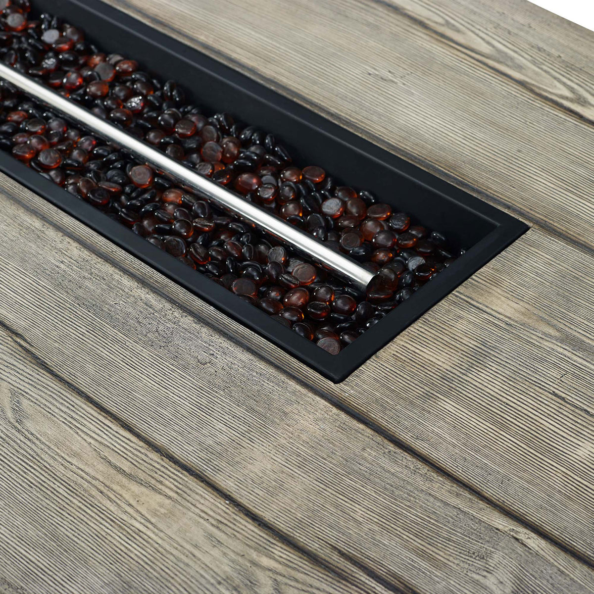 Tempered glass beads surrounding the stainless steel burner bar on the Manteo fire pit tabletop || EEI-3563-LGR || detail_studio