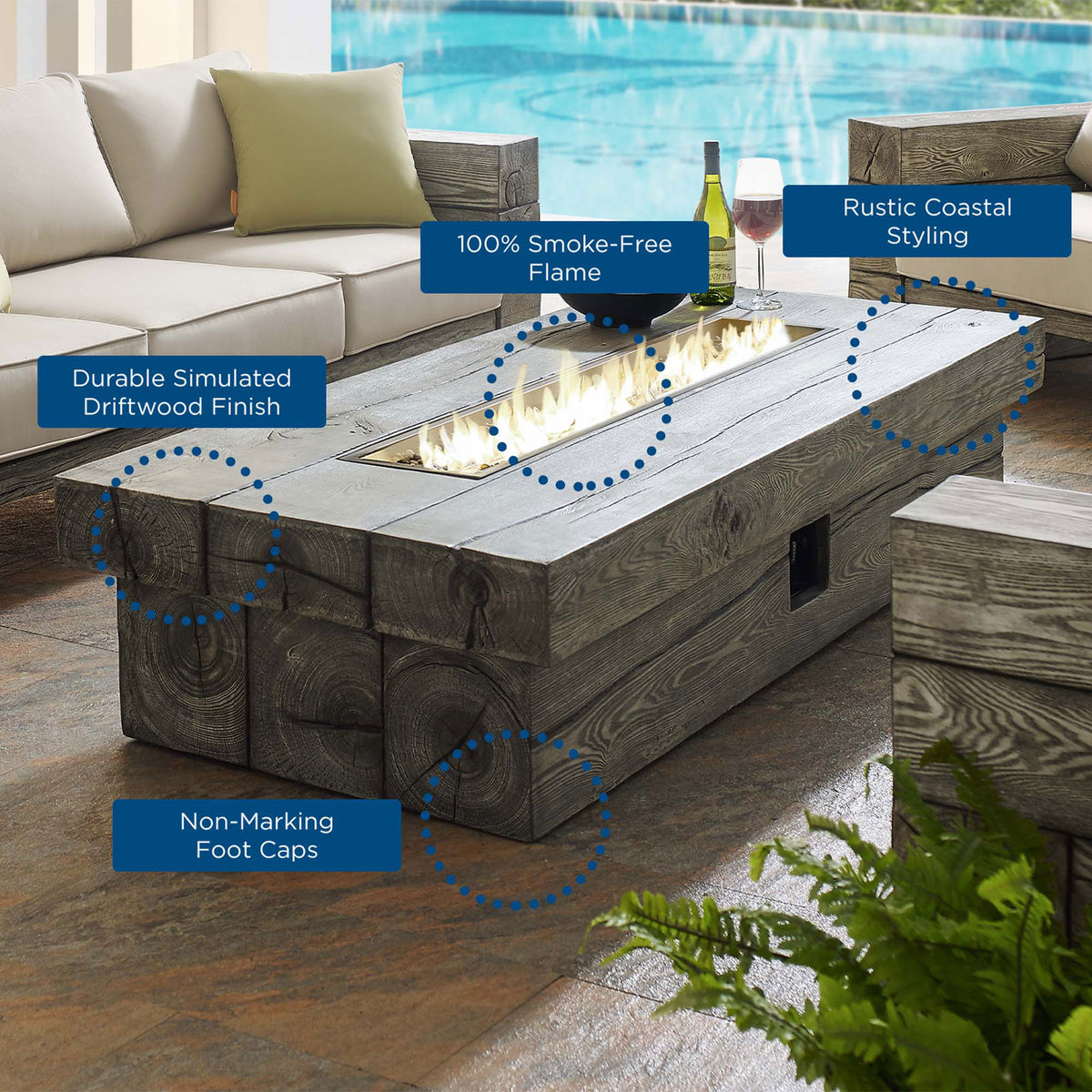 Poolside lounge scene featuring the Manteo fire pit table with glowing flames and coastal decor || EEI-3563-LGR || callout_room