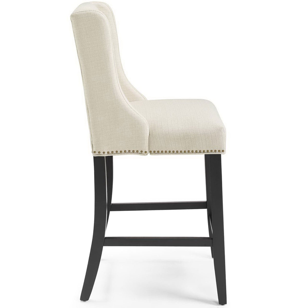 Wingback seat with plush cushioning and nailhead accents along the apron || EEI-3735-BEI || side_studio