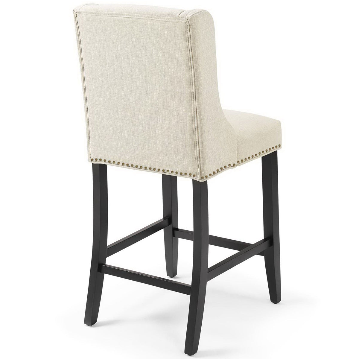 Curved backrest with subtle piping and textured beige upholstery atop dark tapered legs || EEI-3735-BEI || back_angle_studio