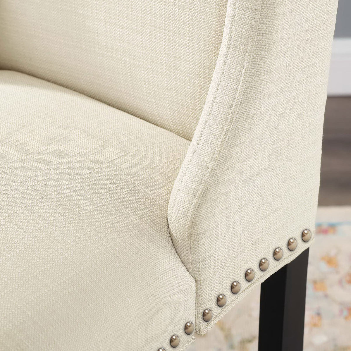 Textured beige fabric and nailhead trim highlight the stool's classic, tailored character || EEI-3735-BEI || detail_room