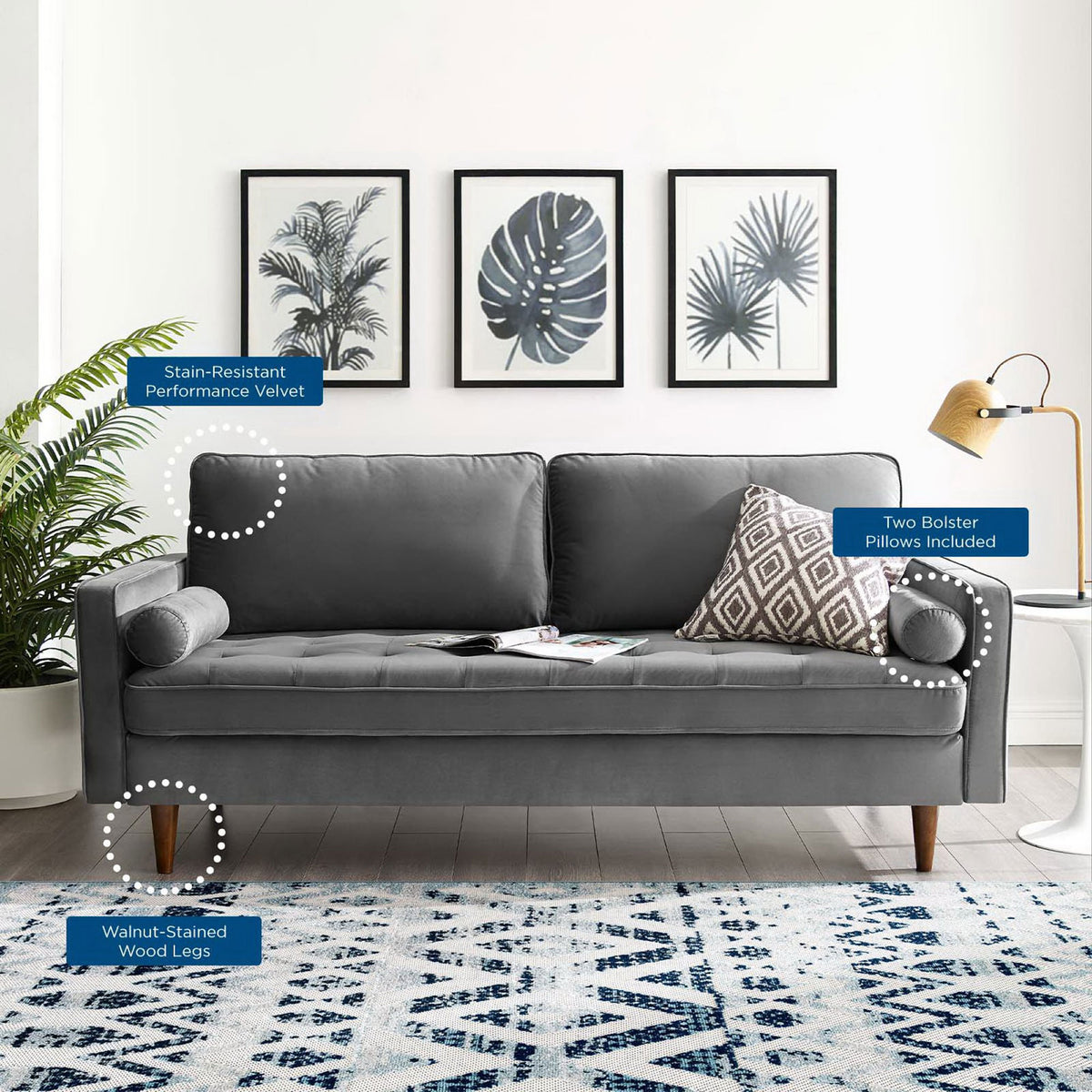 Gray velvet sofa in a stylish living room with callouts for stain-resistant fabric, bolster pillows, and wood legs || EEI-3764-GRY || callout_room