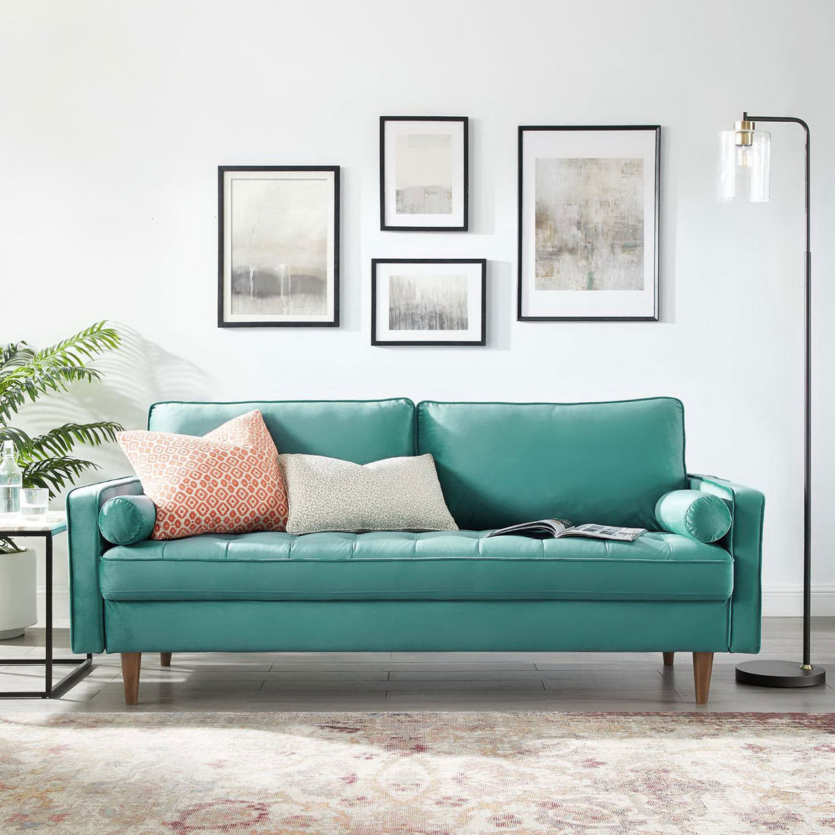 Teal Valour velvet sofa styled in a bright living room with accent pillows and a floor lamp || EEI-3764-TEA || front_room