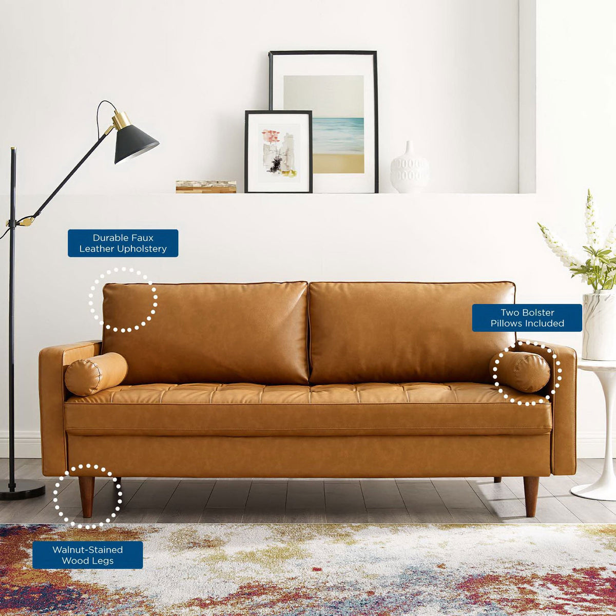 Tan vegan leather sofa in a bright room with callouts to durable upholstery, bolster pillows, and wood legs || EEI-3765-TAN || callout_room