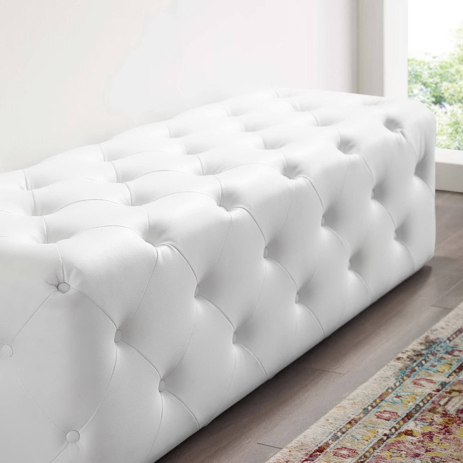 Textured faux leather and crisp tuft seams highlight quality craftsmanship || EEI-3769-WHI || detail_room