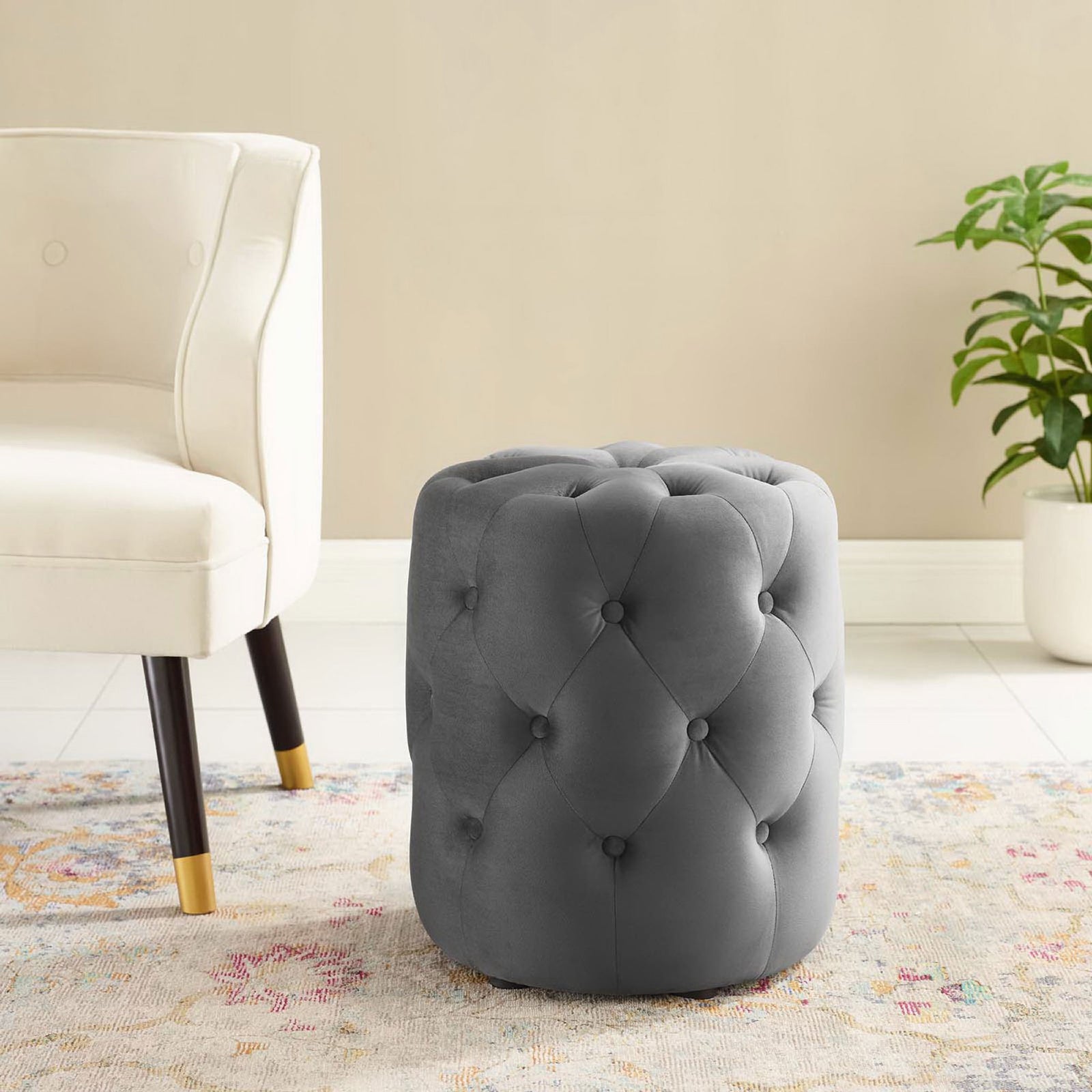 Gray tufted velvet ottoman brings modern elegance and extra seating to a bright contemporary living room || EEI-3778-GRY || front_room