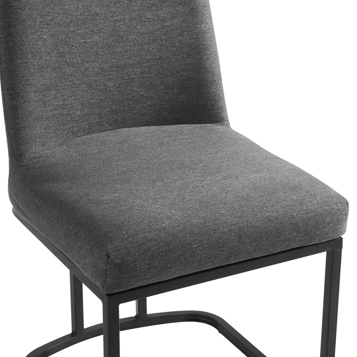 Plush charcoal seat cushion and smooth upholstery detail on the Amplify sled base dining chair || EEI-3811-BLK-CHA || detail_studio