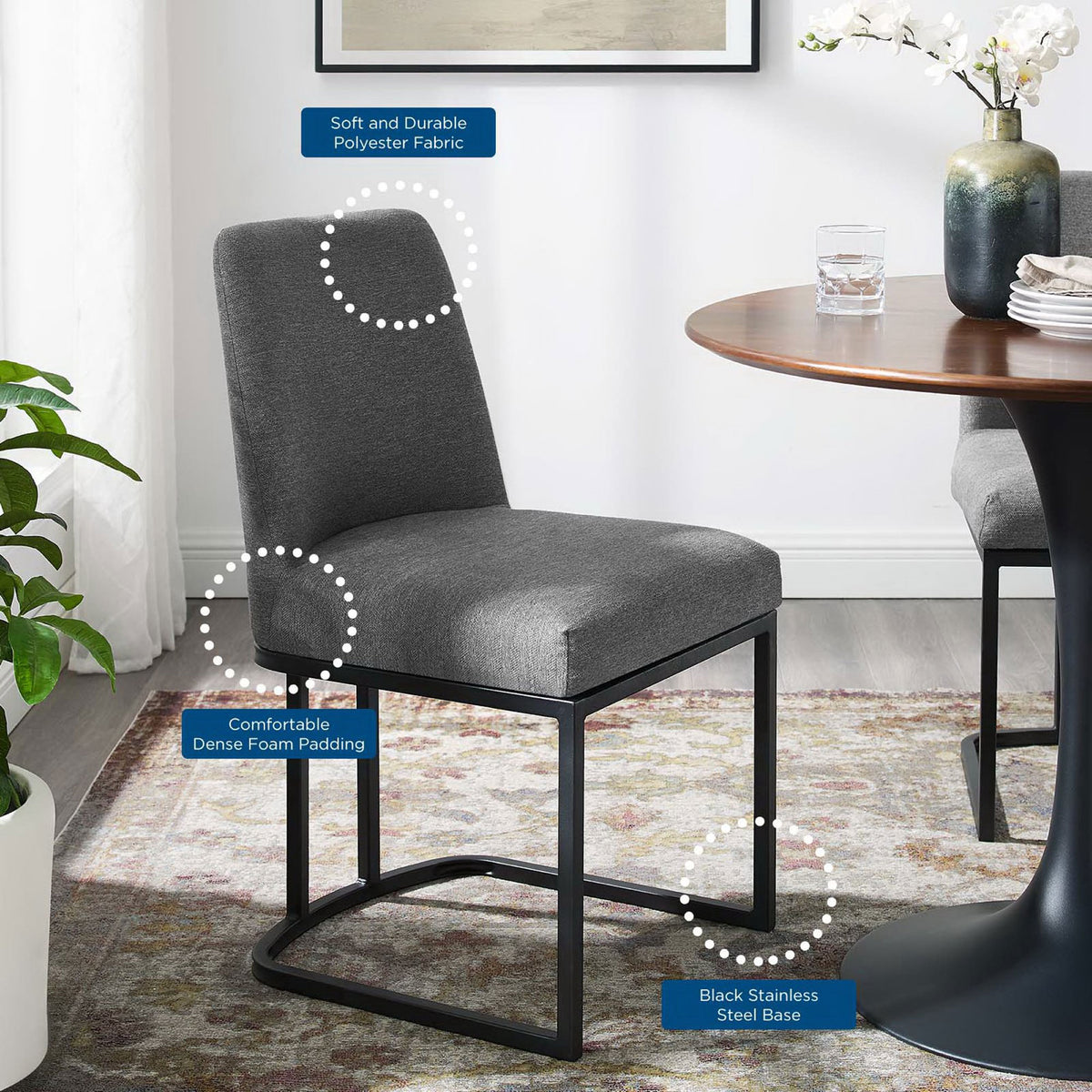 Charcoal sled base dining chair styled at a modern table with callouts for comfort and durability || EEI-3811-BLK-CHA || callout_room