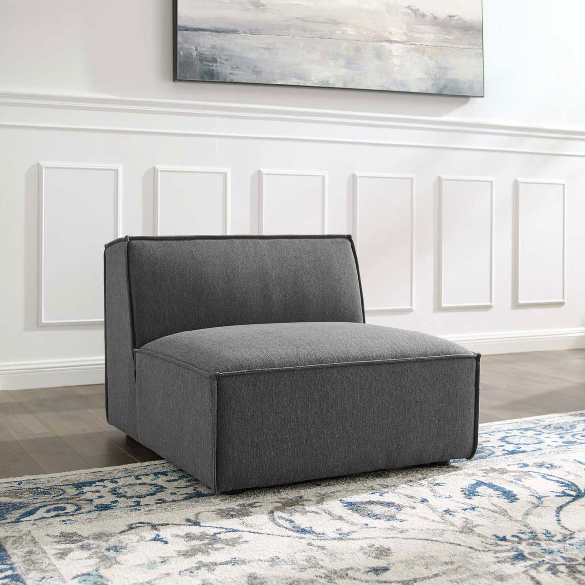 Modern charcoal armless chair anchors the room with plush comfort and tailored edges || EEI-3872-CHA || front_angle_room