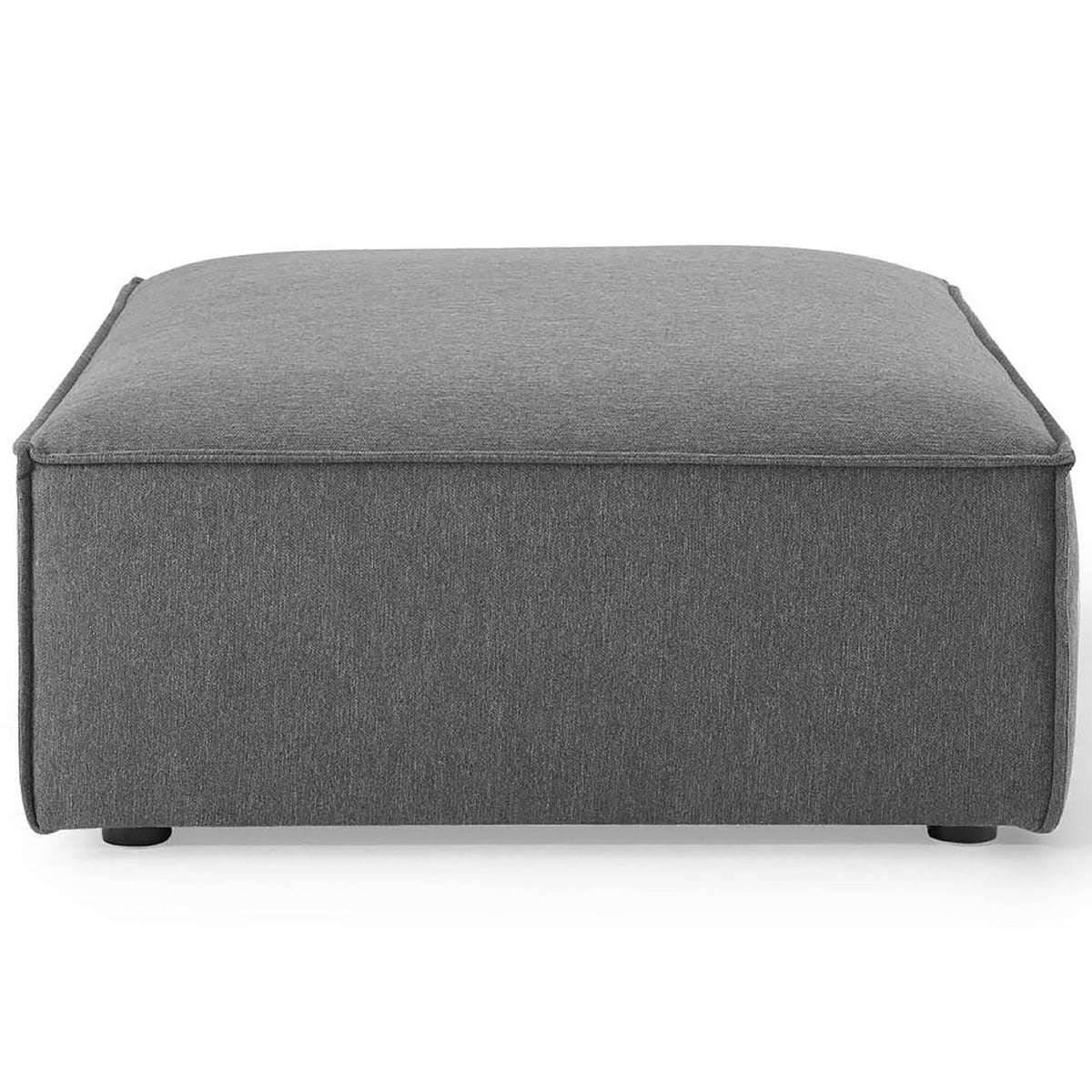 Boxy charcoal fabric ottoman with smooth top cushion and neatly tailored seams along the base || EEI-3873-CHA || front_studio