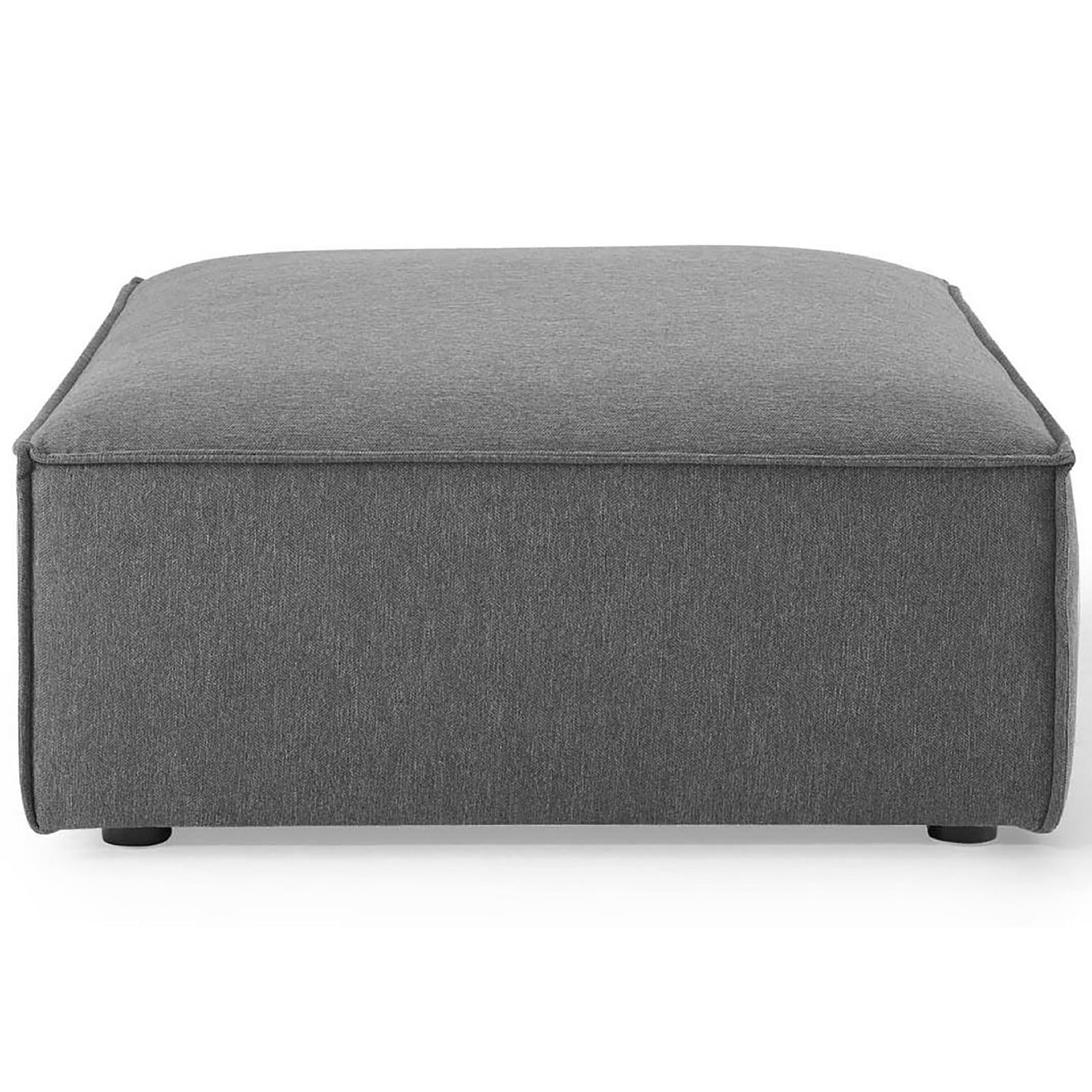 Boxy charcoal fabric ottoman with smooth top cushion and neatly tailored seams along the base || EEI-3873-CHA || front_studio