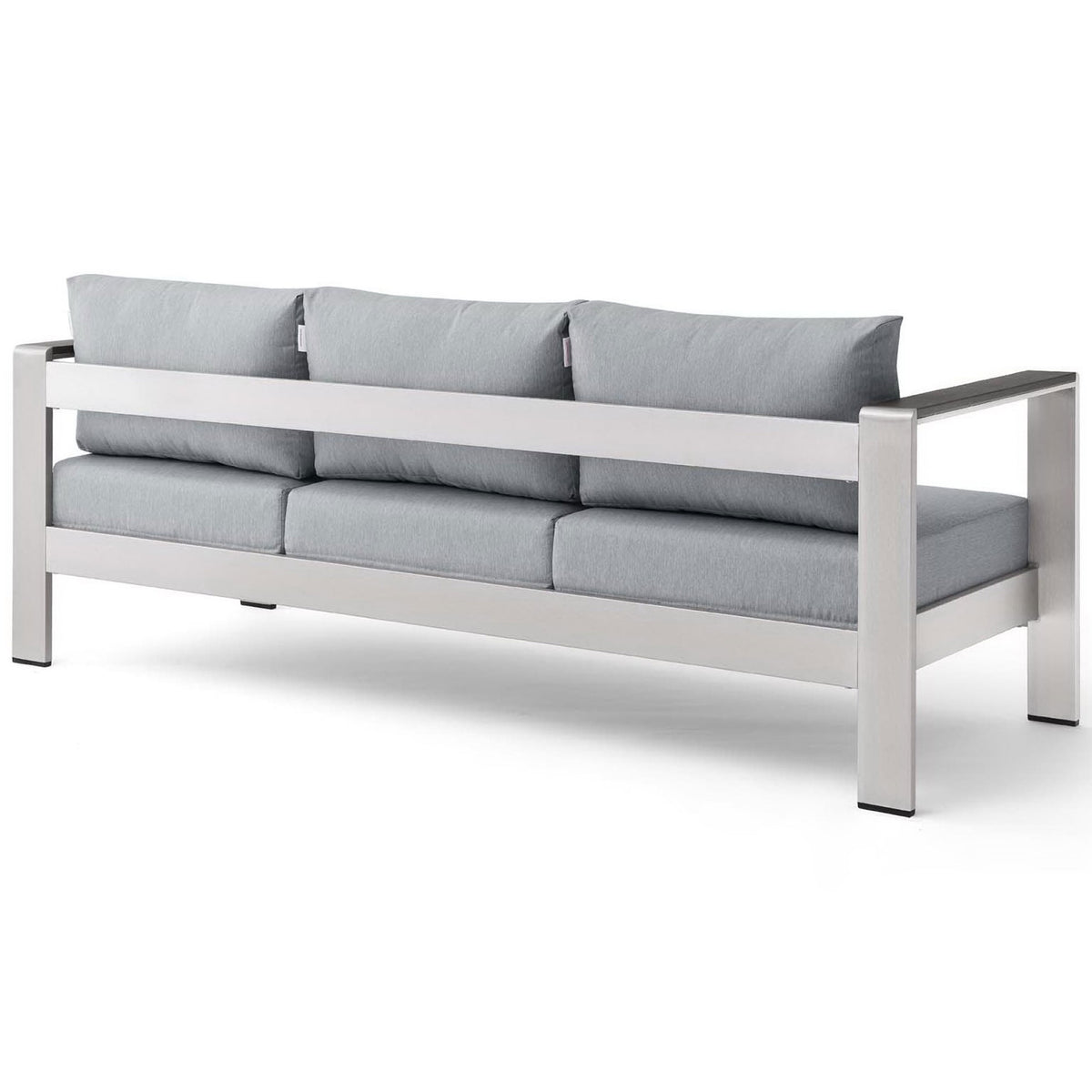 Continuous aluminum back rail supports three neatly tailored gray cushions for modern appeal || EEI-3917-SLV-GRY || back_angle_studio
