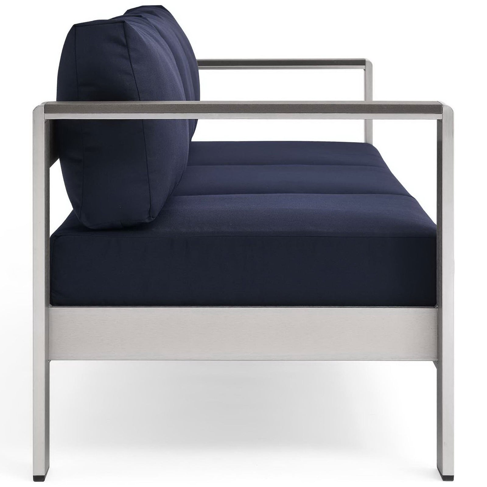 Slim silhouette highlights thick navy cushions resting on a sturdy brushed aluminum base || EEI-3917-SLV-NAV || side_studio