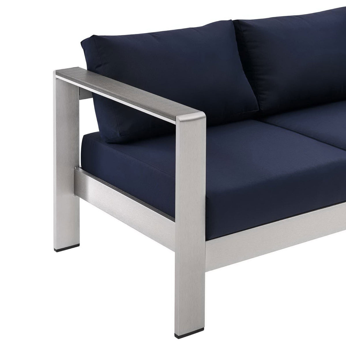 Wide metal armrest contrasts with smooth navy cushions for a refined outdoor seating look || EEI-3917-SLV-NAV || detail_studio