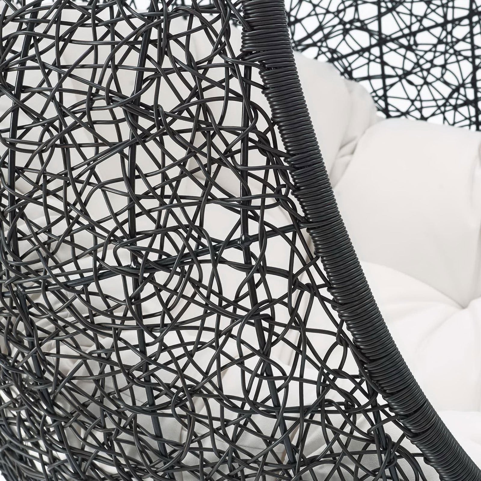 Close-up of dark rattan frame texture and white cushion showing durable outdoor construction || EEI-3943-BLK-WHI || detail_studio