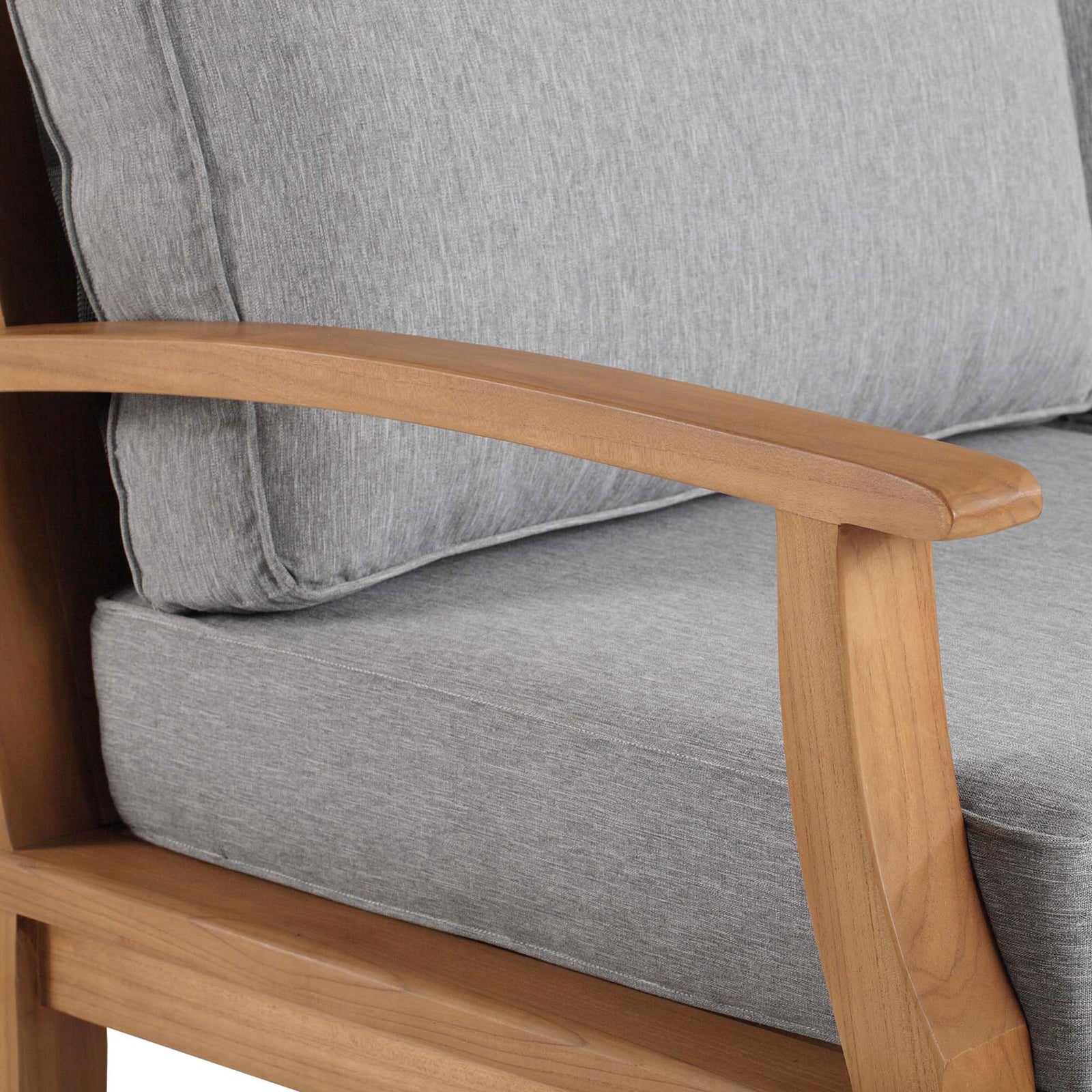 Smooth teak armrest and plush gray cushions showcasing quality outdoor craftsmanship || EEI-4176-NAT-GRY || detail_studio