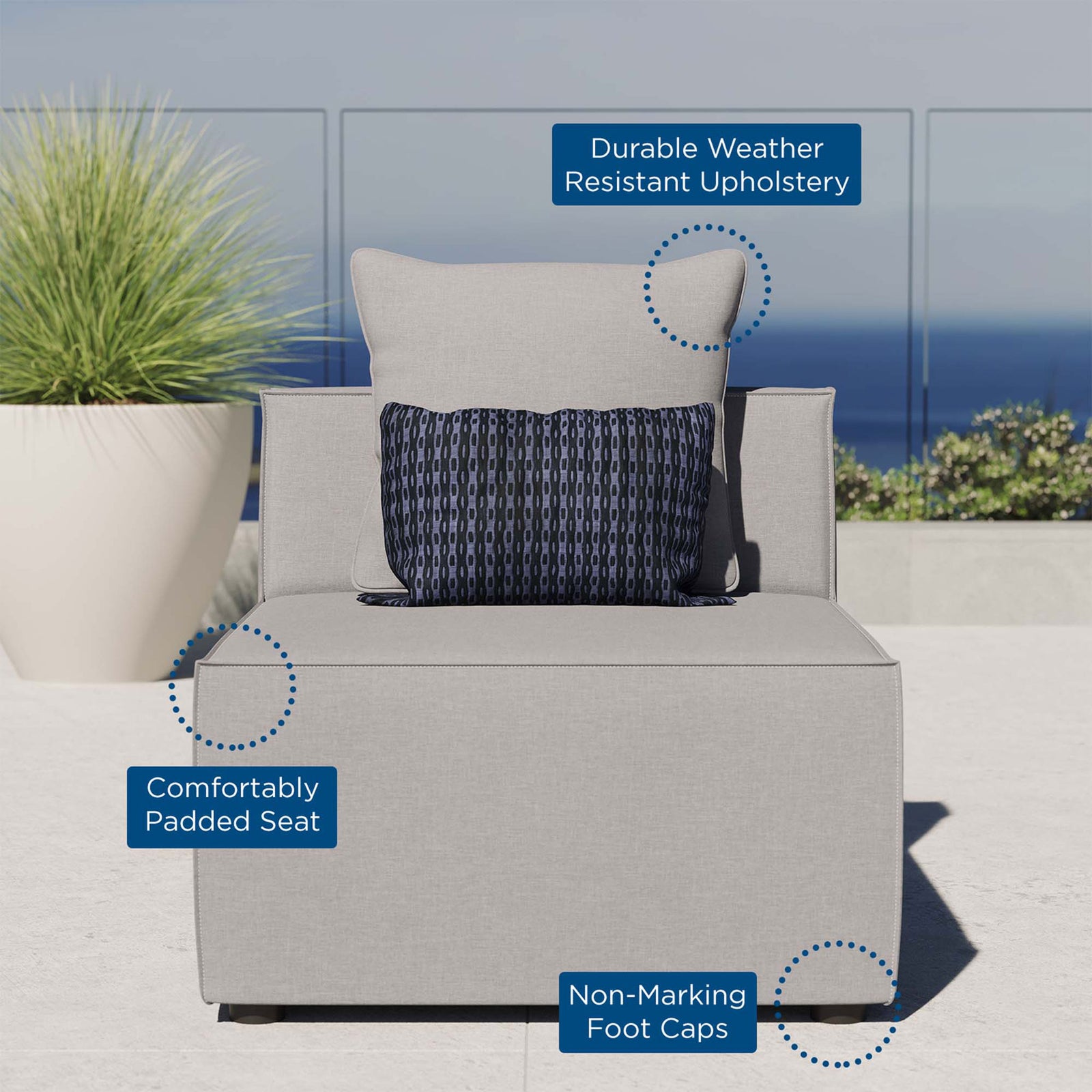 Gray outdoor armless chair on patio featuring padded seat, weather resistant upholstery, and non marking foot caps || EEI-4209-GRY || callout_room