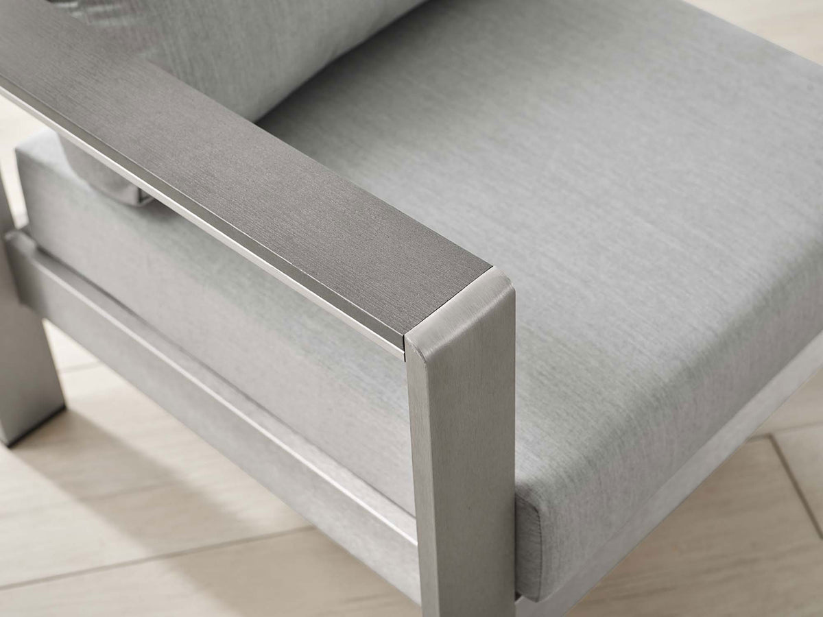 Textured gray Sunbrella(r) fabric and smooth arm surface bring modern polish to your deck || EEI-4225-SLV-GRY || detail_room