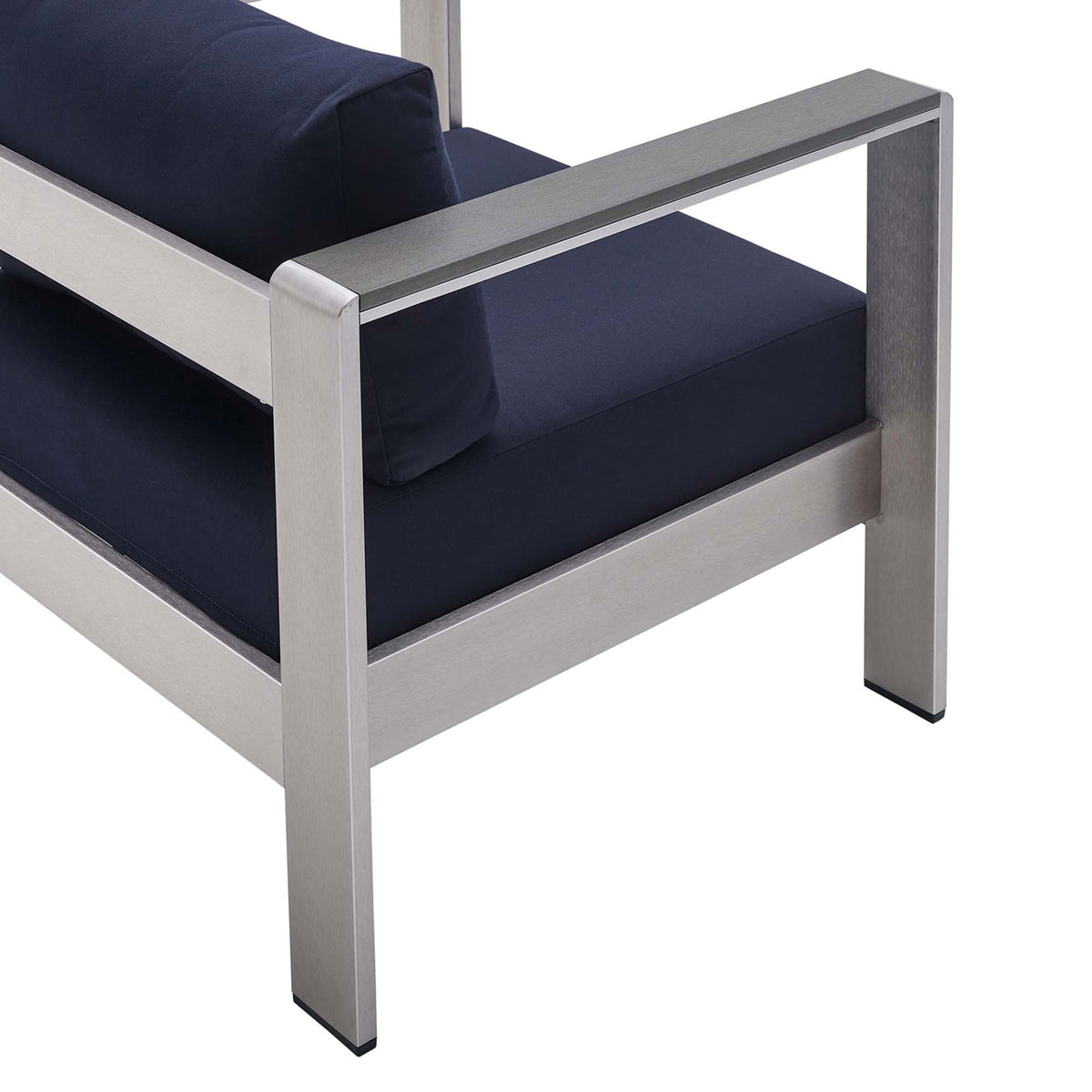Navy Sunbrella(r) cushion and crisp frame detailing emphasize the chair's modern design || EEI-4225-SLV-NAV || detail_studio