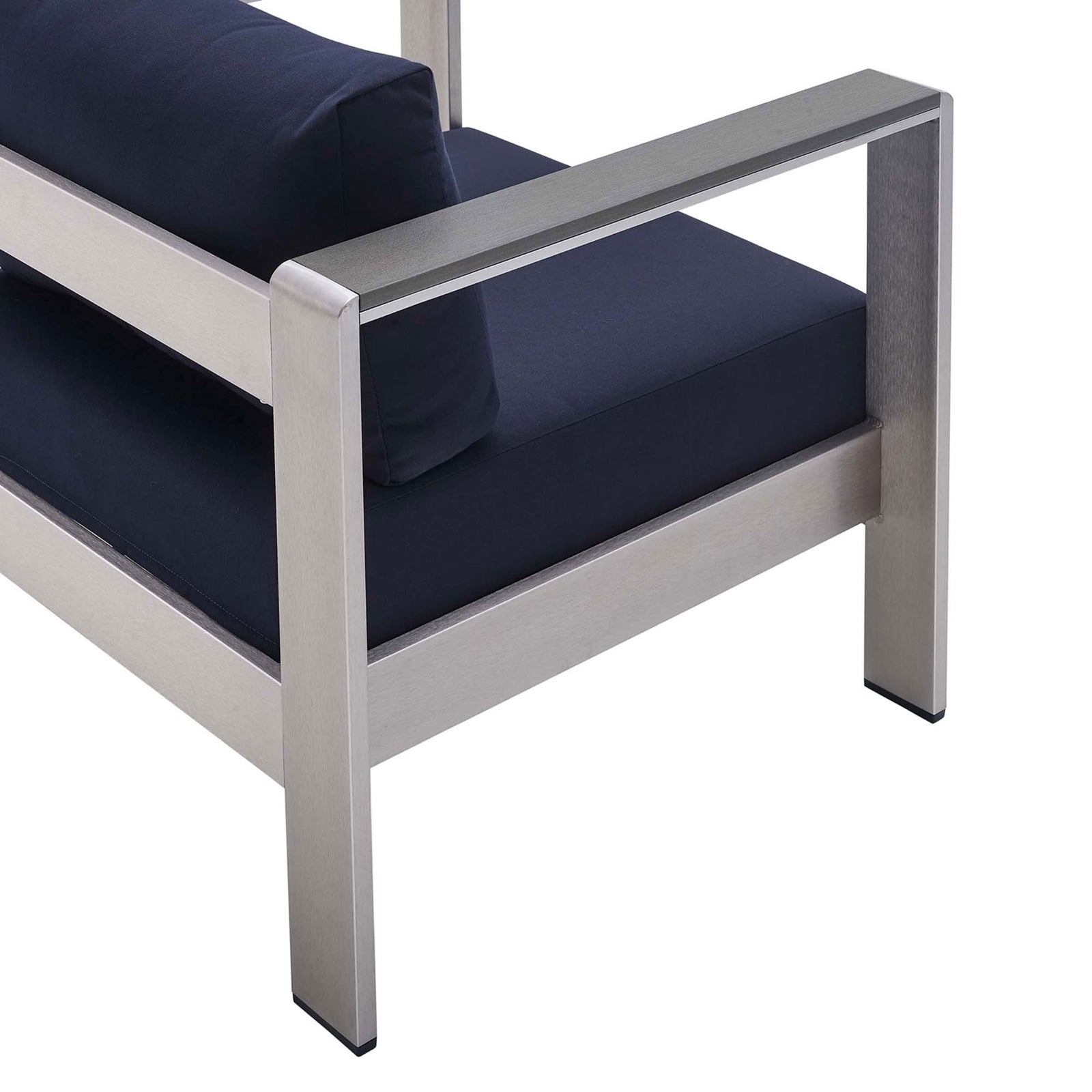 Navy Sunbrella(r) cushion and crisp frame detailing emphasize the chair's modern design || EEI-4225-SLV-NAV || detail_studio