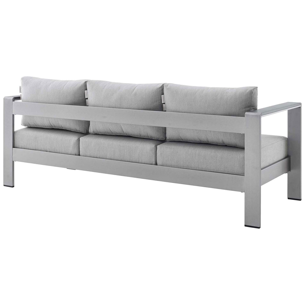 Continuous aluminum back rail supports three well-tailored gray Sunbrella cushions || EEI-4228-SLV-GRY || back_angle_studio