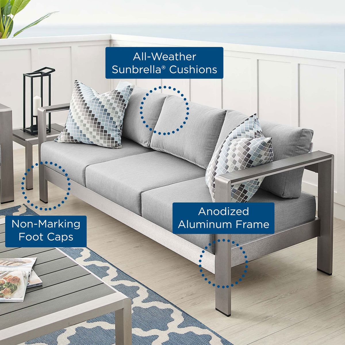 Outdoor sofa highlights all-weather Sunbrella cushions, anodized aluminum frame, and foot caps || EEI-4228-SLV-GRY || callout_room