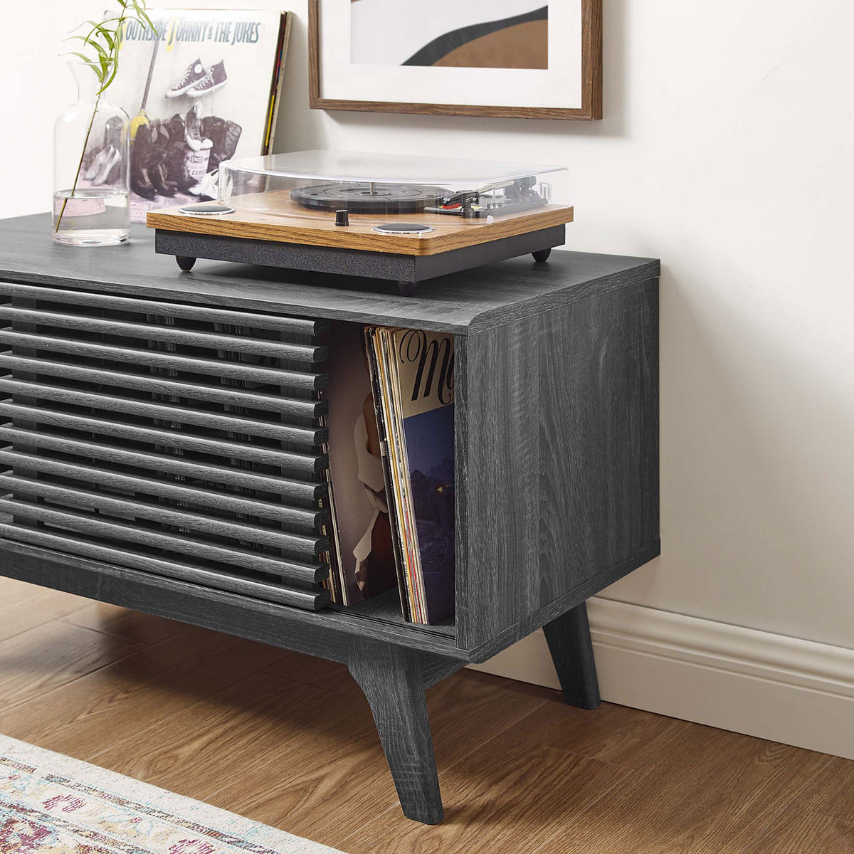 Charcoal record stand showing easy access to albums with open storage and turntable within reach. || EEI-4263-CHA || storage_open_room