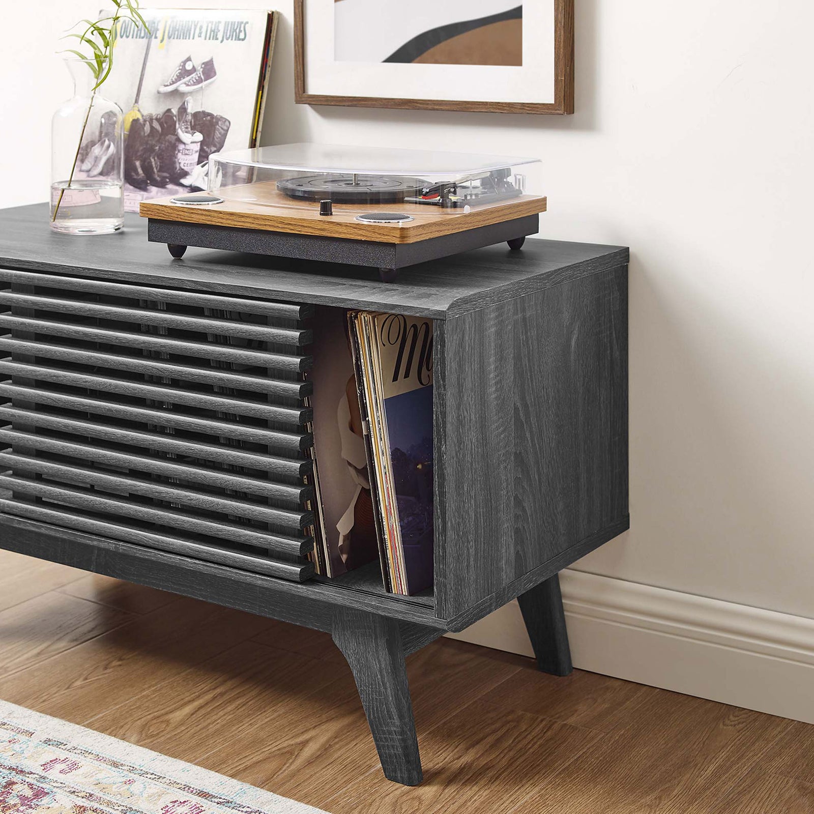 Charcoal record stand showing easy access to albums with open storage and turntable within reach. || EEI-4263-CHA || storage_open_room