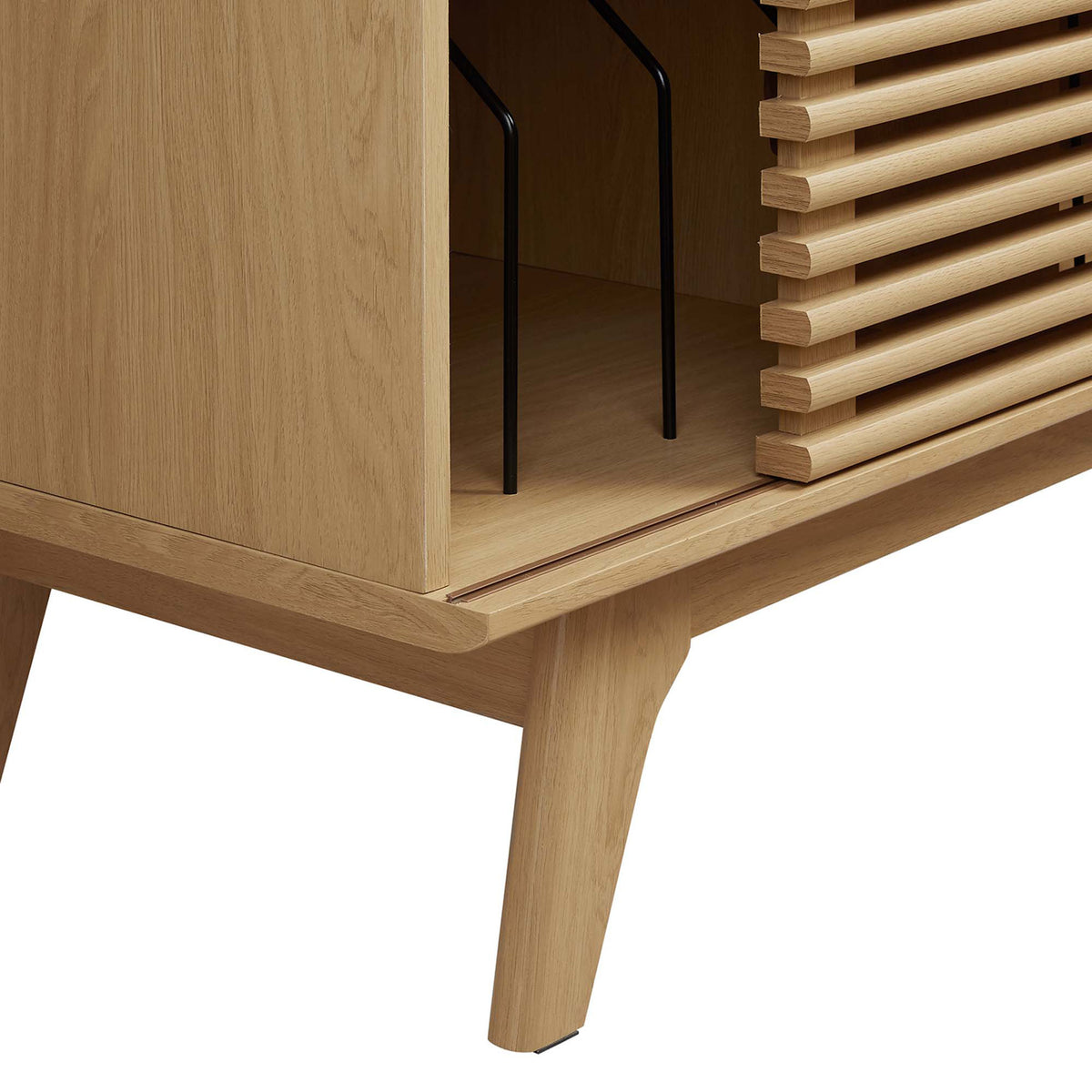 Detail of oak stand leg showing wood grain texture, smooth edges, and solid mid-century base. || EEI-4263-OAK || leg_studio