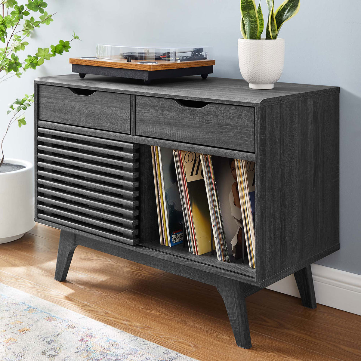 Charcoal record stand styled in a modern living room with a turntable and neatly organized vinyl collection || EEI-4323-CHA || front_angle_room