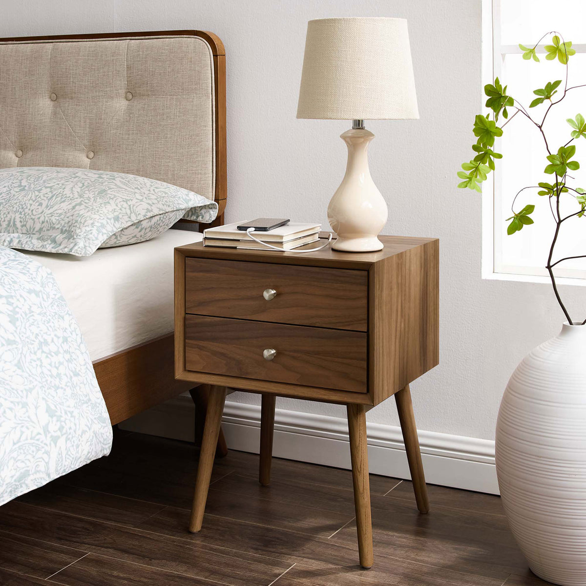 Walnut nightstand by the bed styled with lamp, books, and greenery for a cozy look || EEI-4343-WAL-WAL || front_angle_room