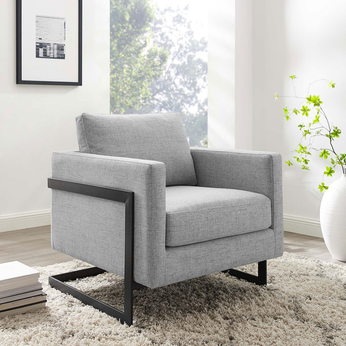 Modern accent chair refreshes the room with soft gray upholstery and a bold black base. || EEI-4391-BLK-LGR || front_angle_room