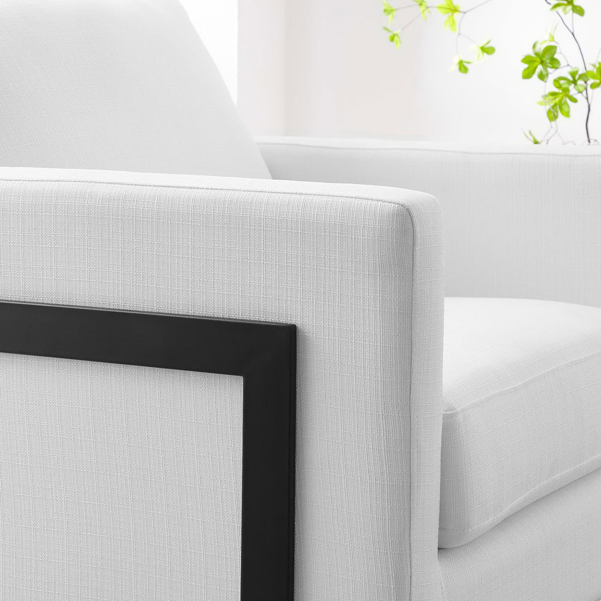 Soft woven fabric and supportive cushions bring comfort with modern edge || EEI-4391-BLK-WHI || detail_room