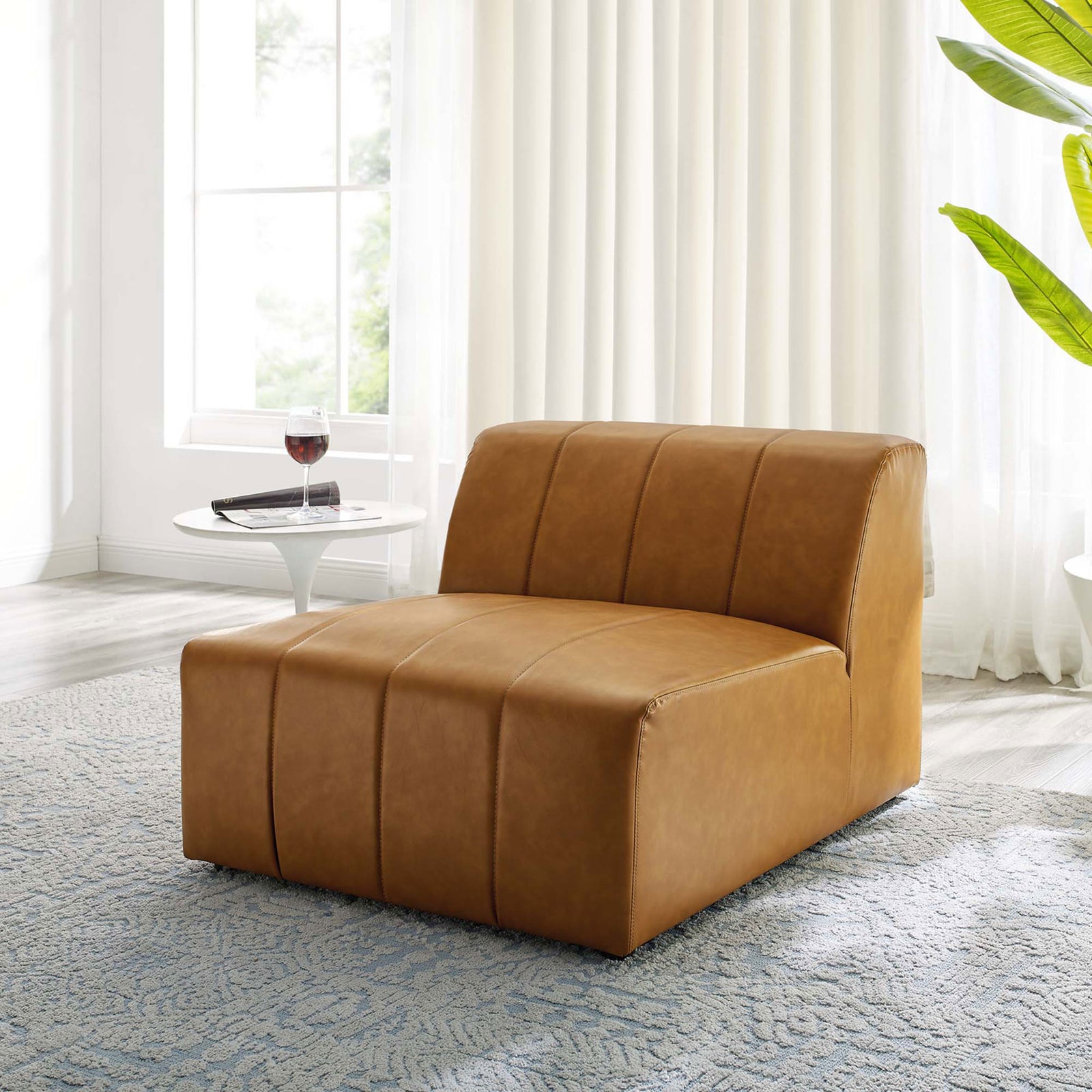 Chic tan vegan leather lounge chair adds inviting comfort and mid-century style to your space || EEI-4399-TAN || front_angle_room