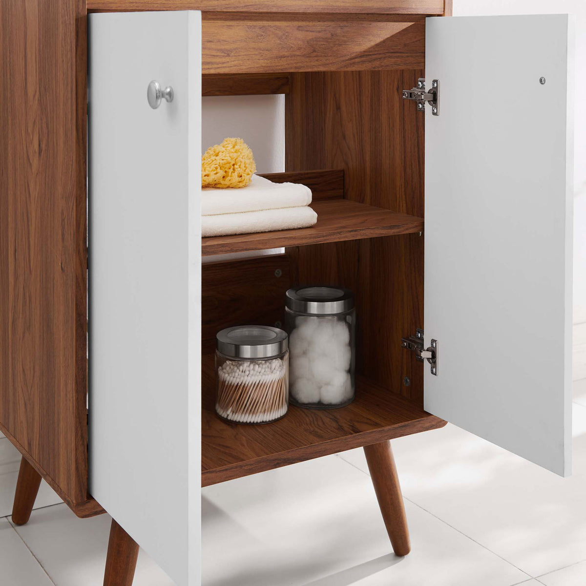 Open cabinet reveals roomy shelving for towels and bath essentials. || EEI-4432-WAL-WHI || storage_open_room