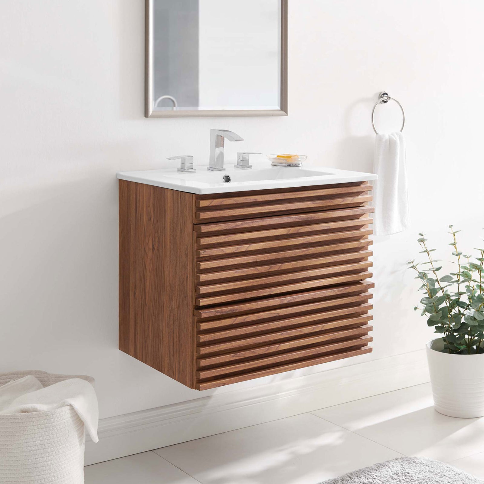Floating 24-inch vanity adds airy modern style, pairing walnut slats with a bright ceramic countertop. || EEI-4433-WAL-WHI || front_angle_room