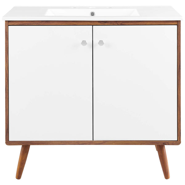 Wide dual doors with chrome knobs below a rectangular ceramic sink. || EEI-4435-WAL-WHI || front_studio