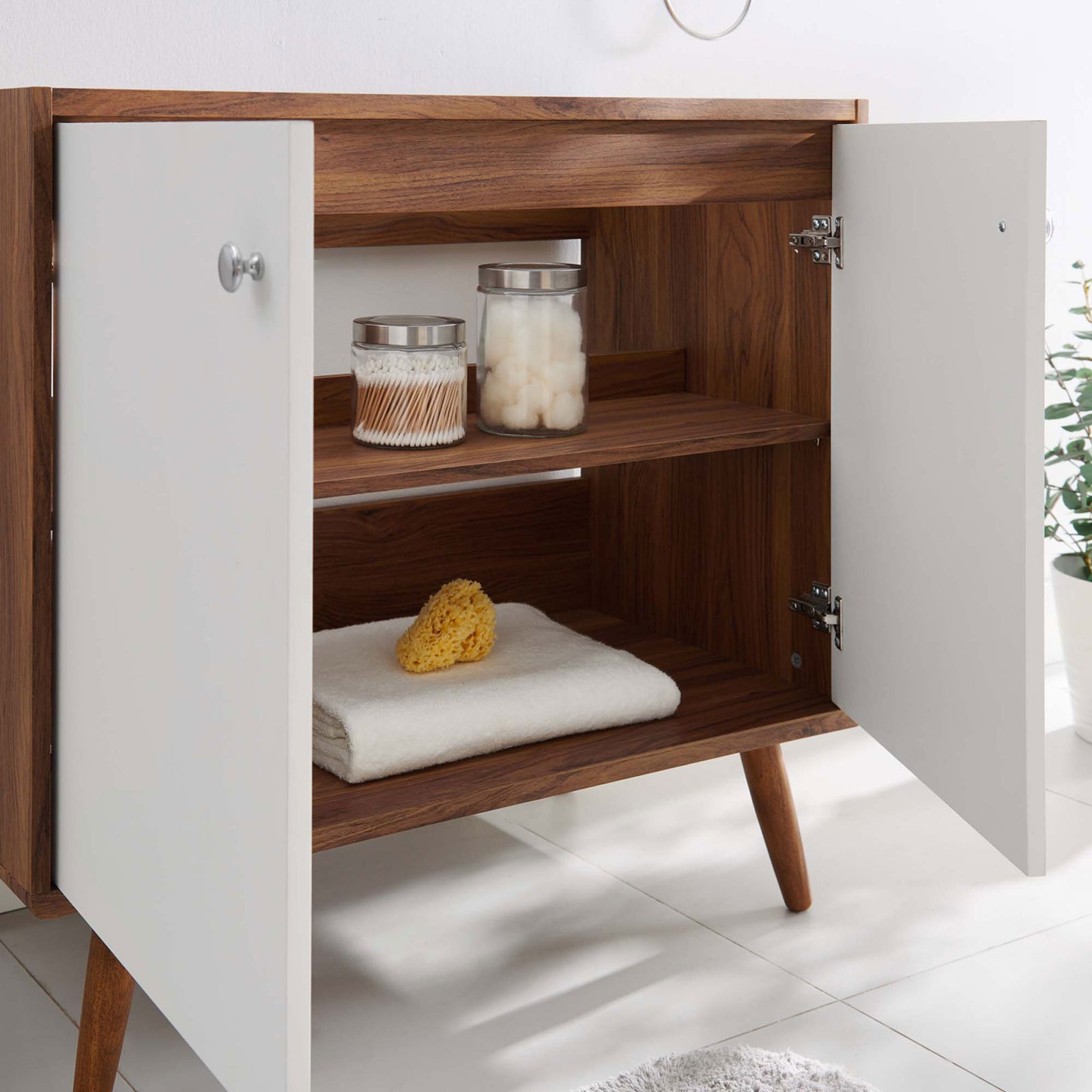 Open cabinet shows ample shelving for towels and bath essentials. || EEI-4435-WAL-WHI || storage_open_room