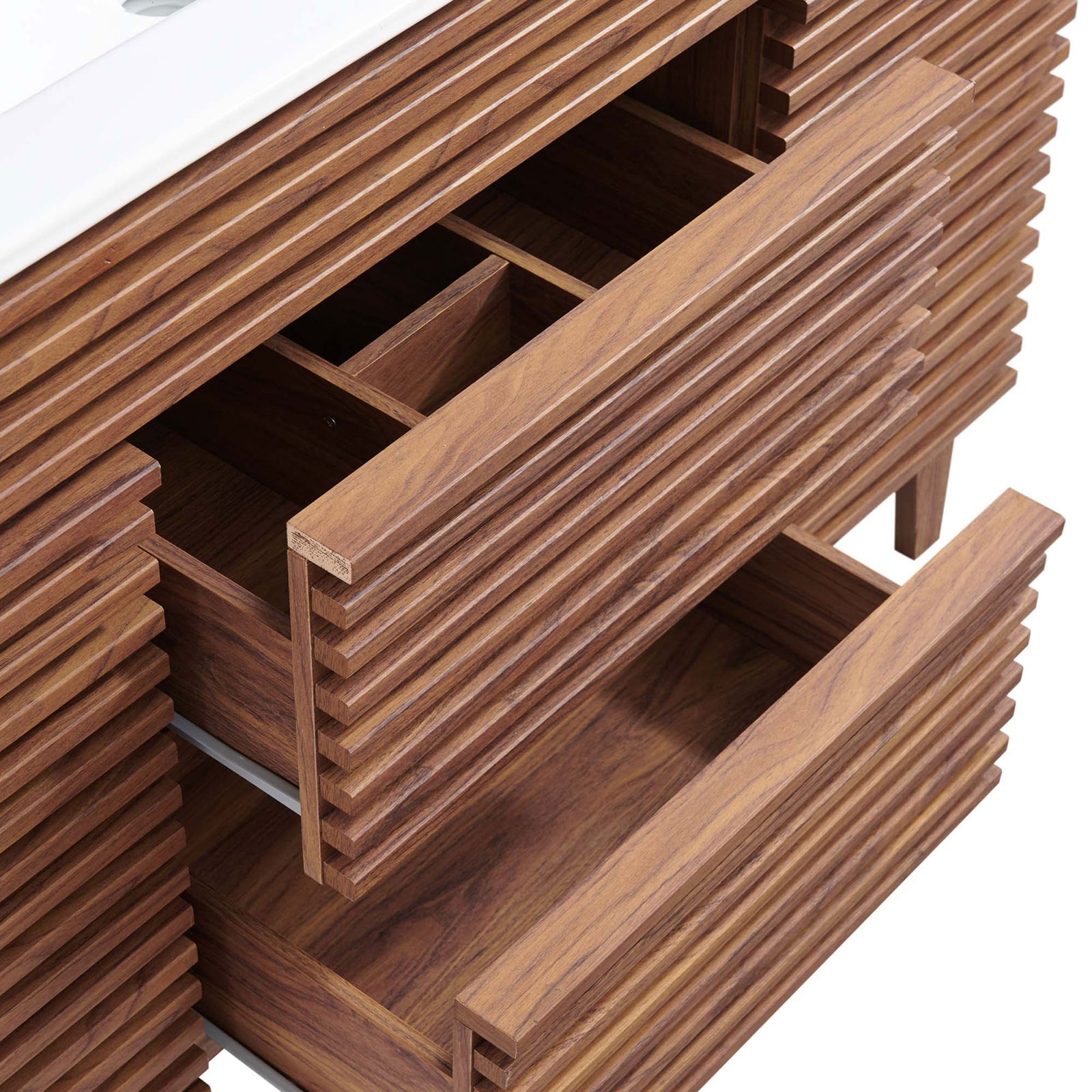 Deep full-extension drawers with compartments keep toiletries neatly organized. || EEI-4439-WAL-WHI || storage_open_studio