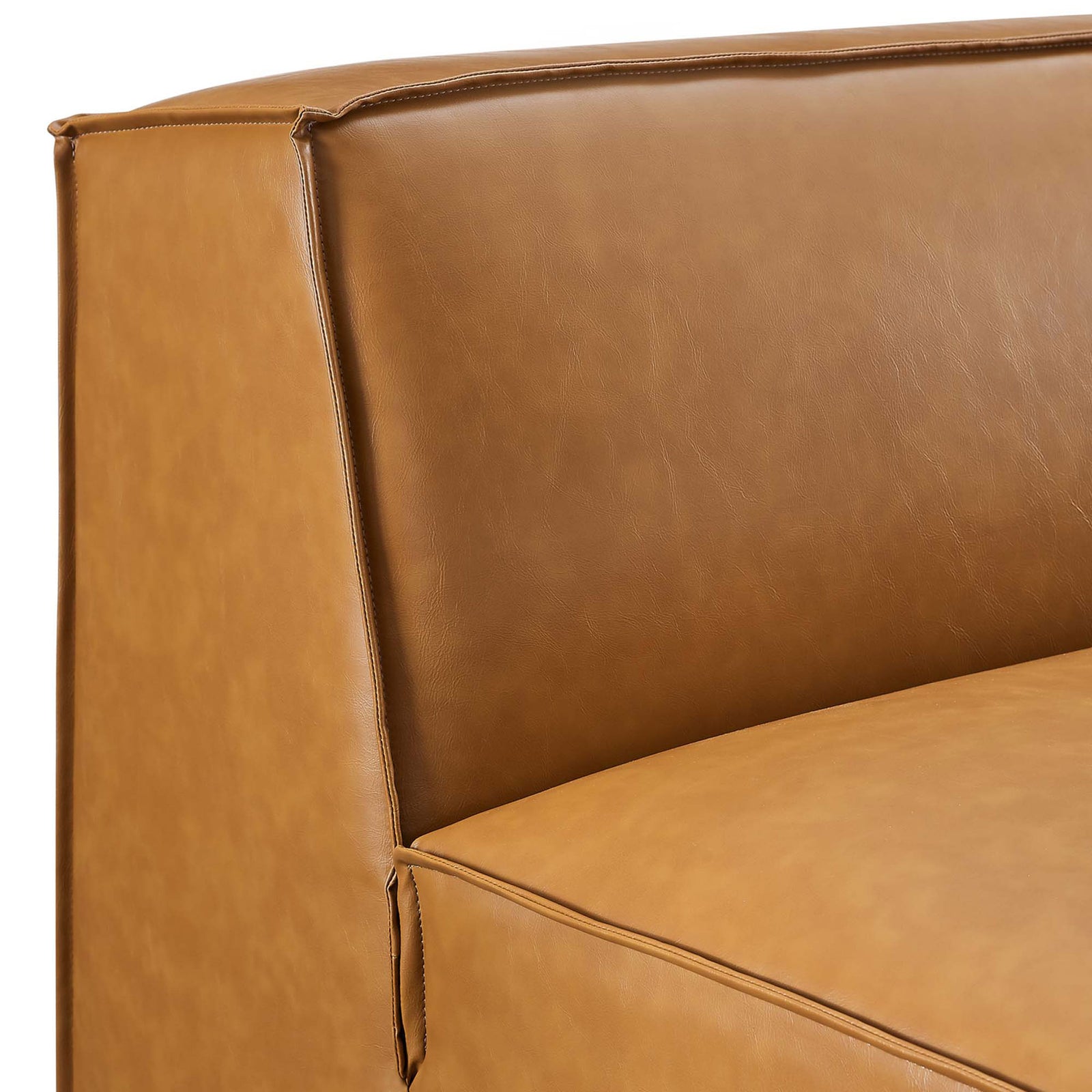 French piping and supple vegan leather texture create a refined, tailored finish. || EEI-4495-TAN || detail_studio