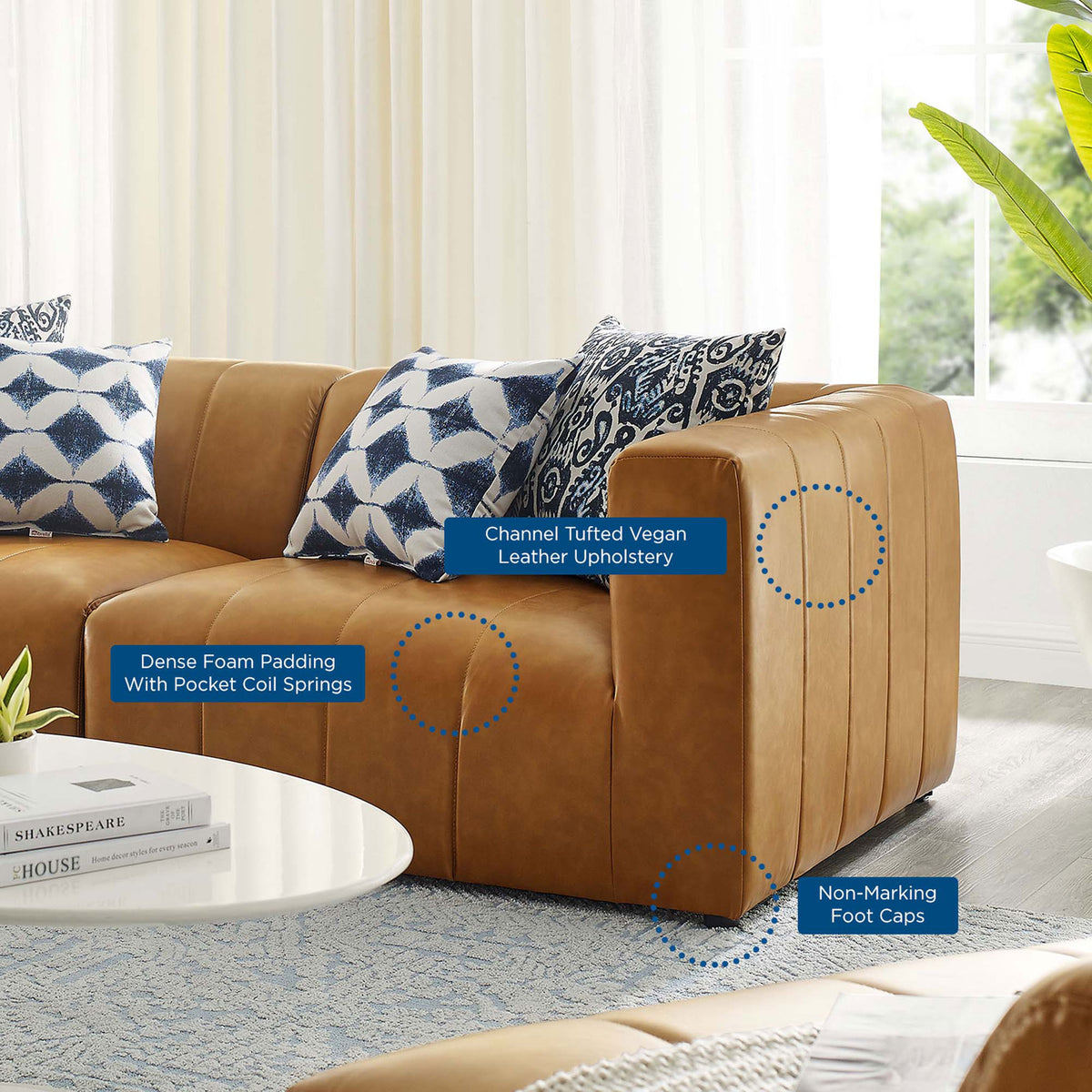 Tan vegan leather loveseat in a bright living room with callouts for comfort and durable details || EEI-4513-TAN || callout_room