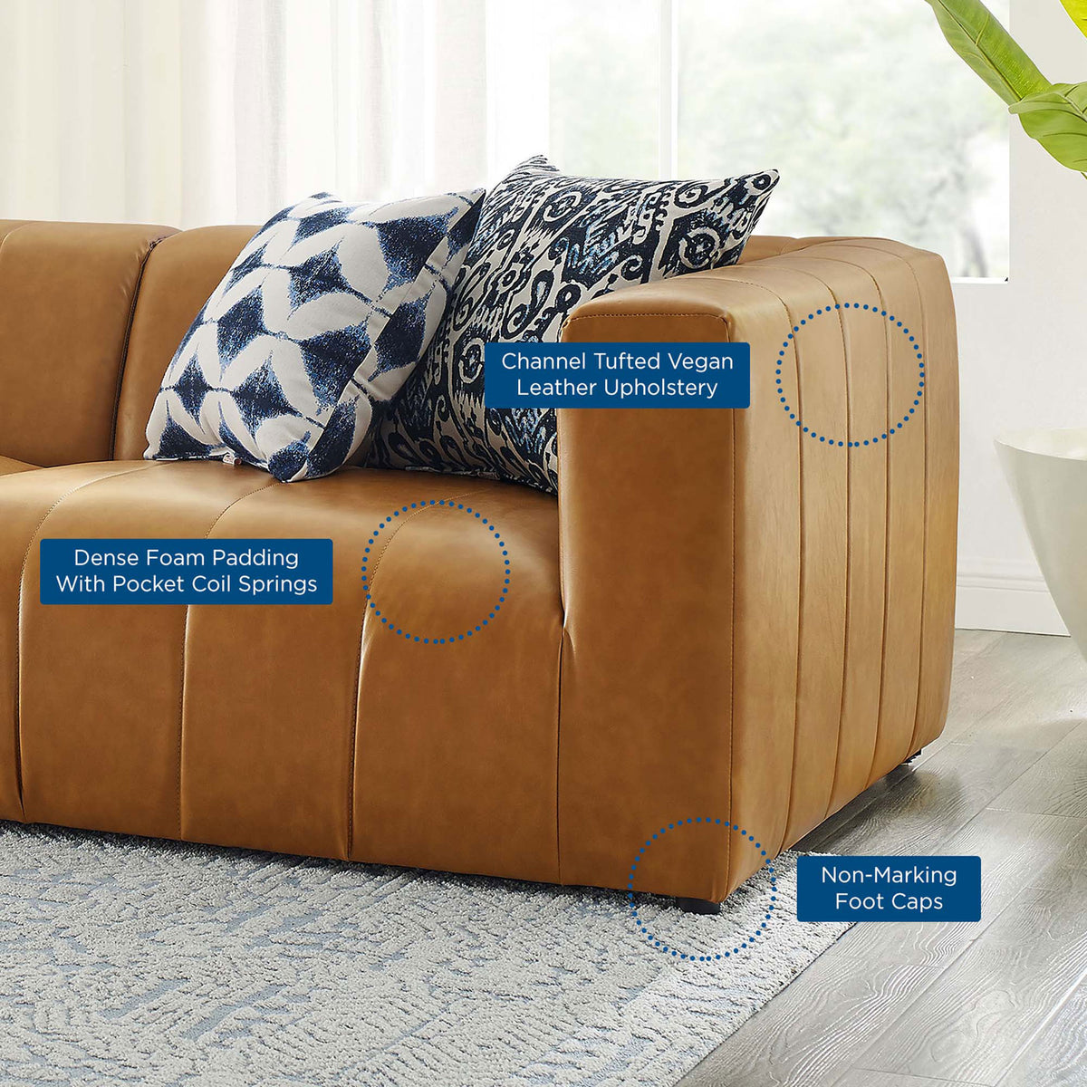 Bartlett tan vegan leather sofa in a living room with callouts for comfort, support, and protective foot caps || EEI-4515-TAN || callout_room