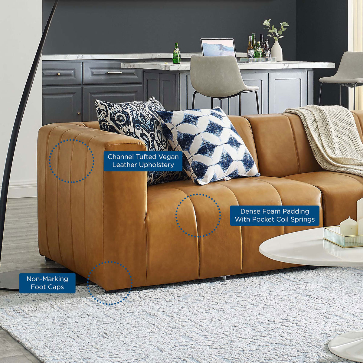 Bartlett tan vegan leather sectional styled in a modern living room with pillows and feature highlights || EEI-4519-TAN || callout_room