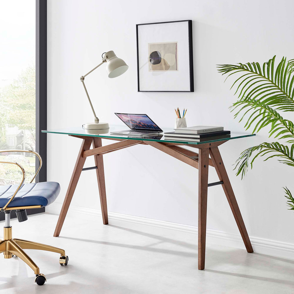 Airy glass desk elevates the home office with warm walnut tones and a minimalist, mid-century feel || EEI-4580-WAL || front_angle_room