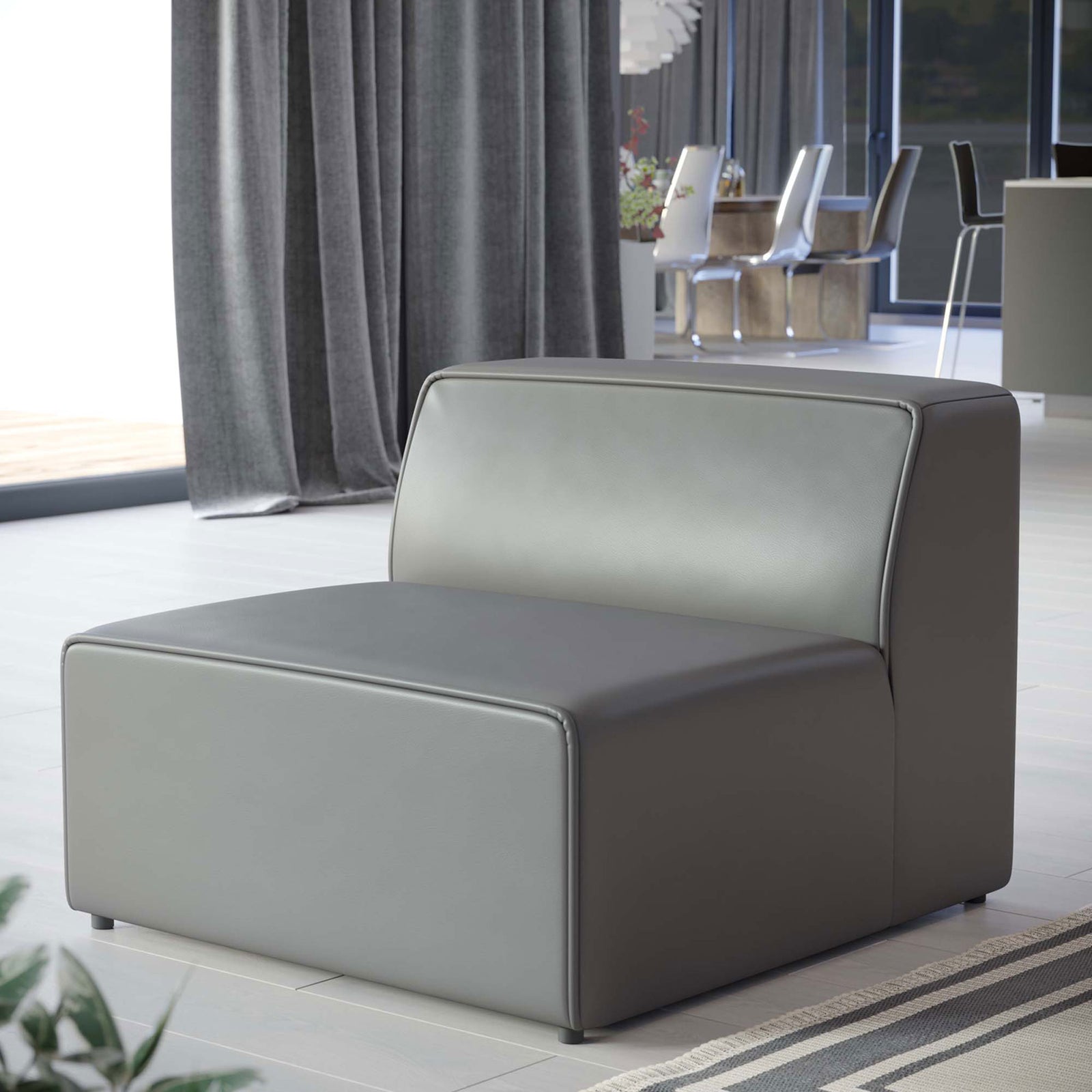 Contemporary gray armless chair in vegan leather brings soft curves and welcoming comfort to living spaces || EEI-4623-GRY || front_angle_room