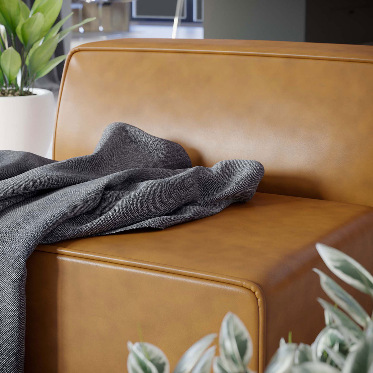 Soft-touch vegan leather and refined trim piping offer an upscale, easy-care finish || EEI-4623-TAN || detail_room