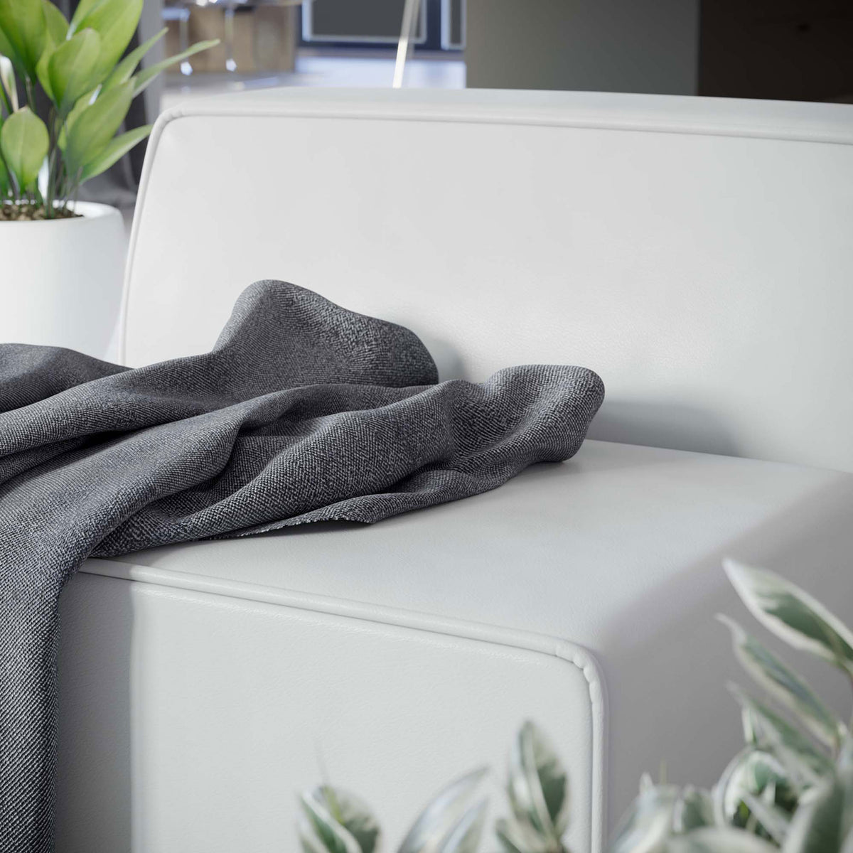 Smooth vegan leather surface with piped edges, styled for relaxed modern lounging || EEI-4623-WHI || detail_room