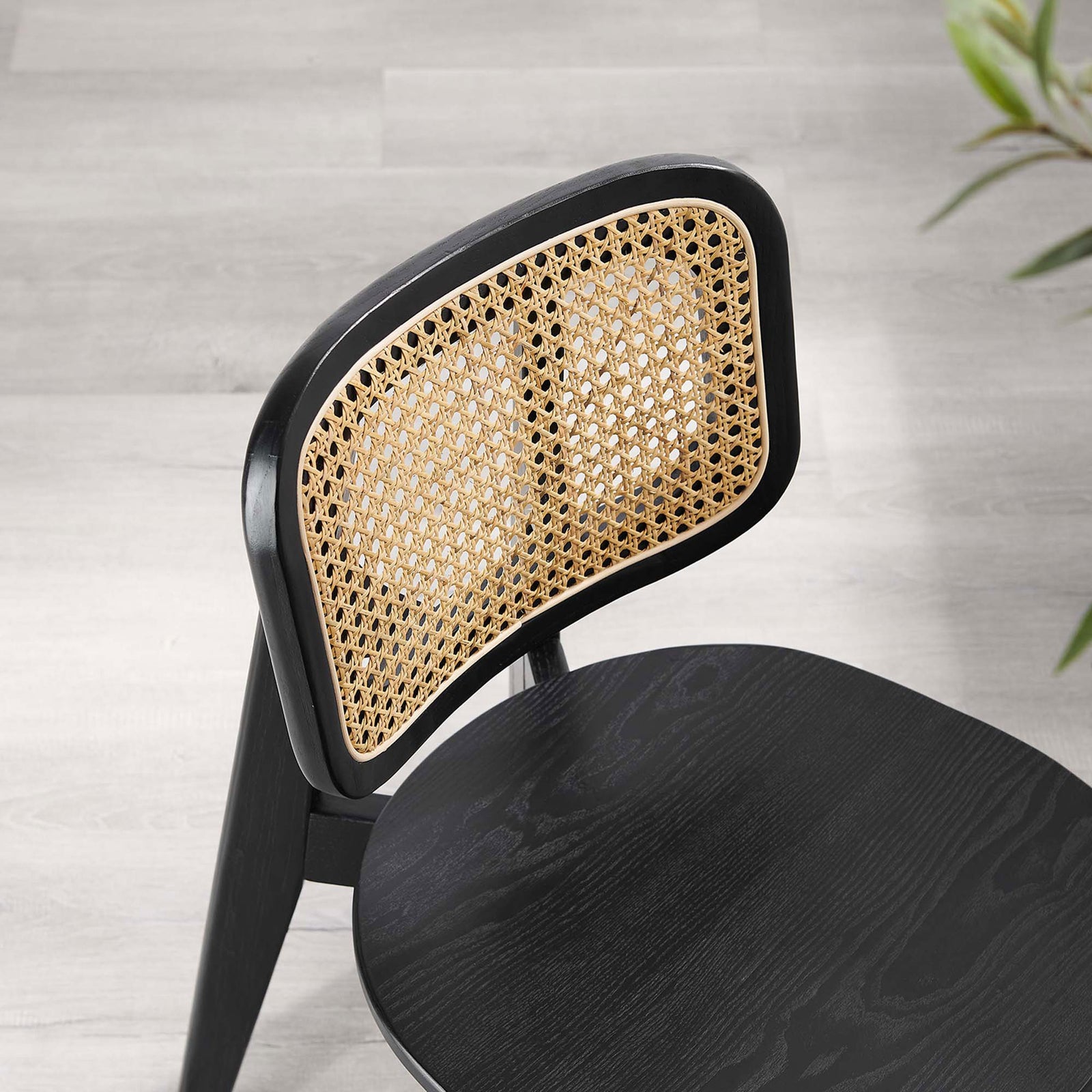 Black wood seat pairs with natural cane backrest to add inviting texture to your dining room || EEI-4645-BLK || detail_room